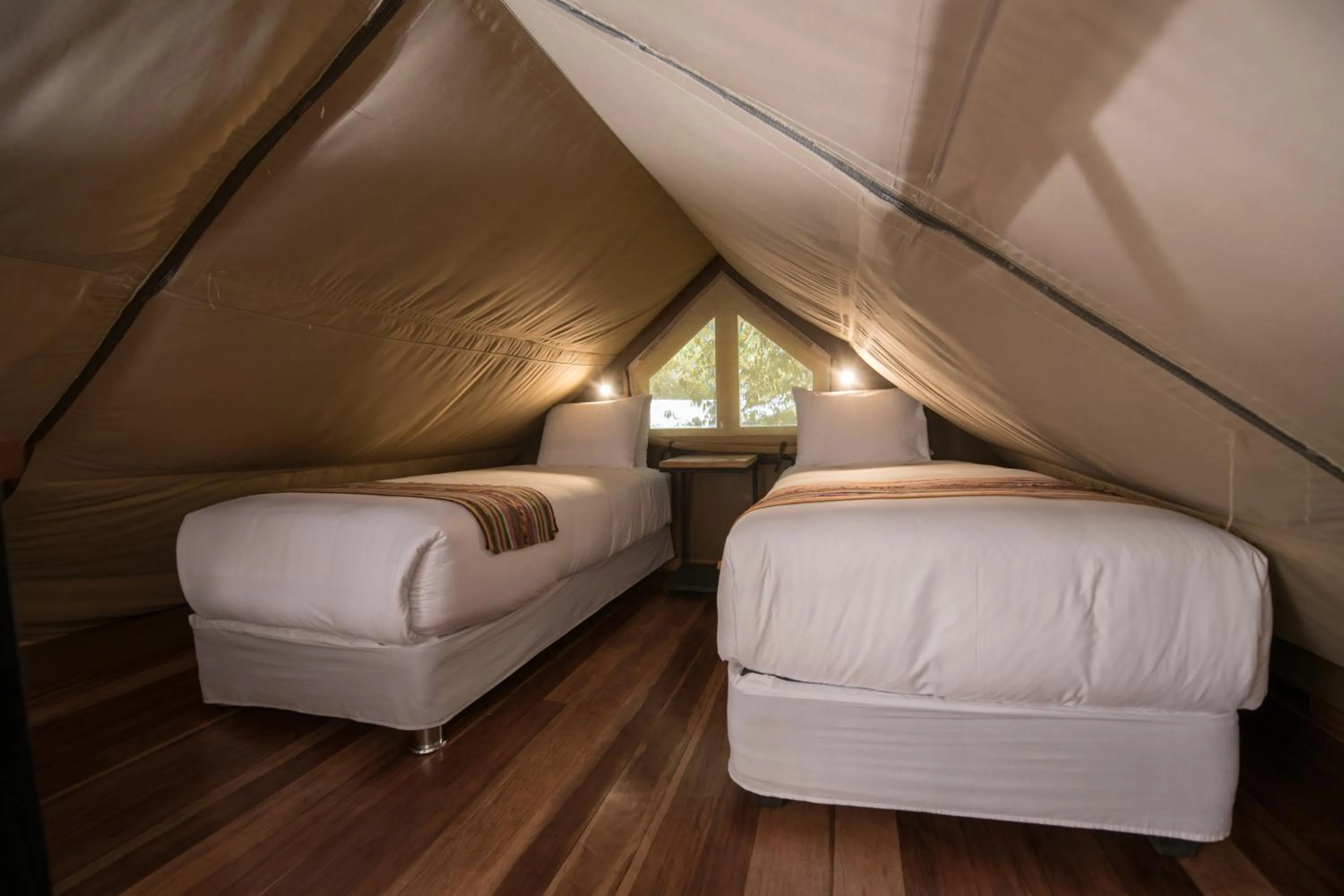 Bed in Las Qolqas EcoResort Ollantaytambo