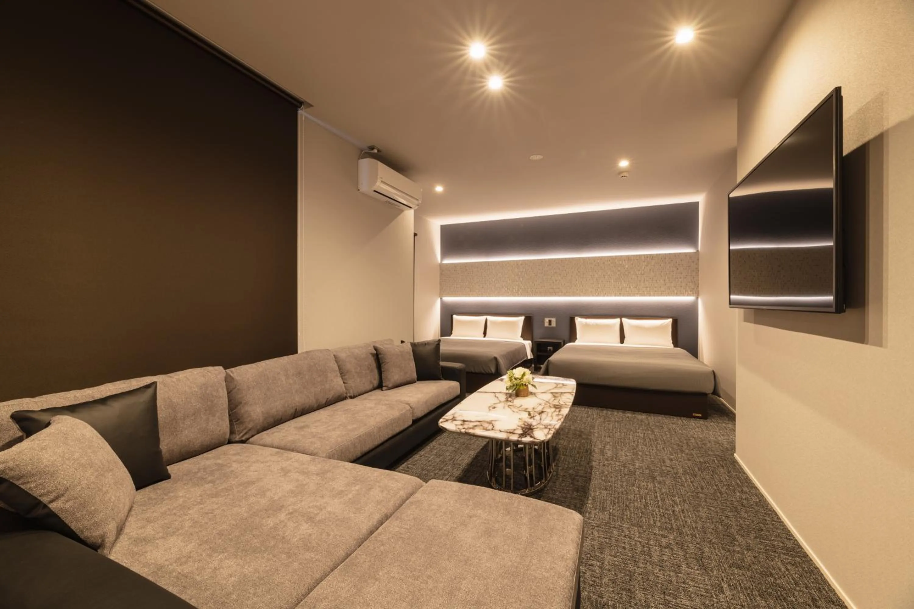 Living room, Bed in GRAND BASE Hakata Premium