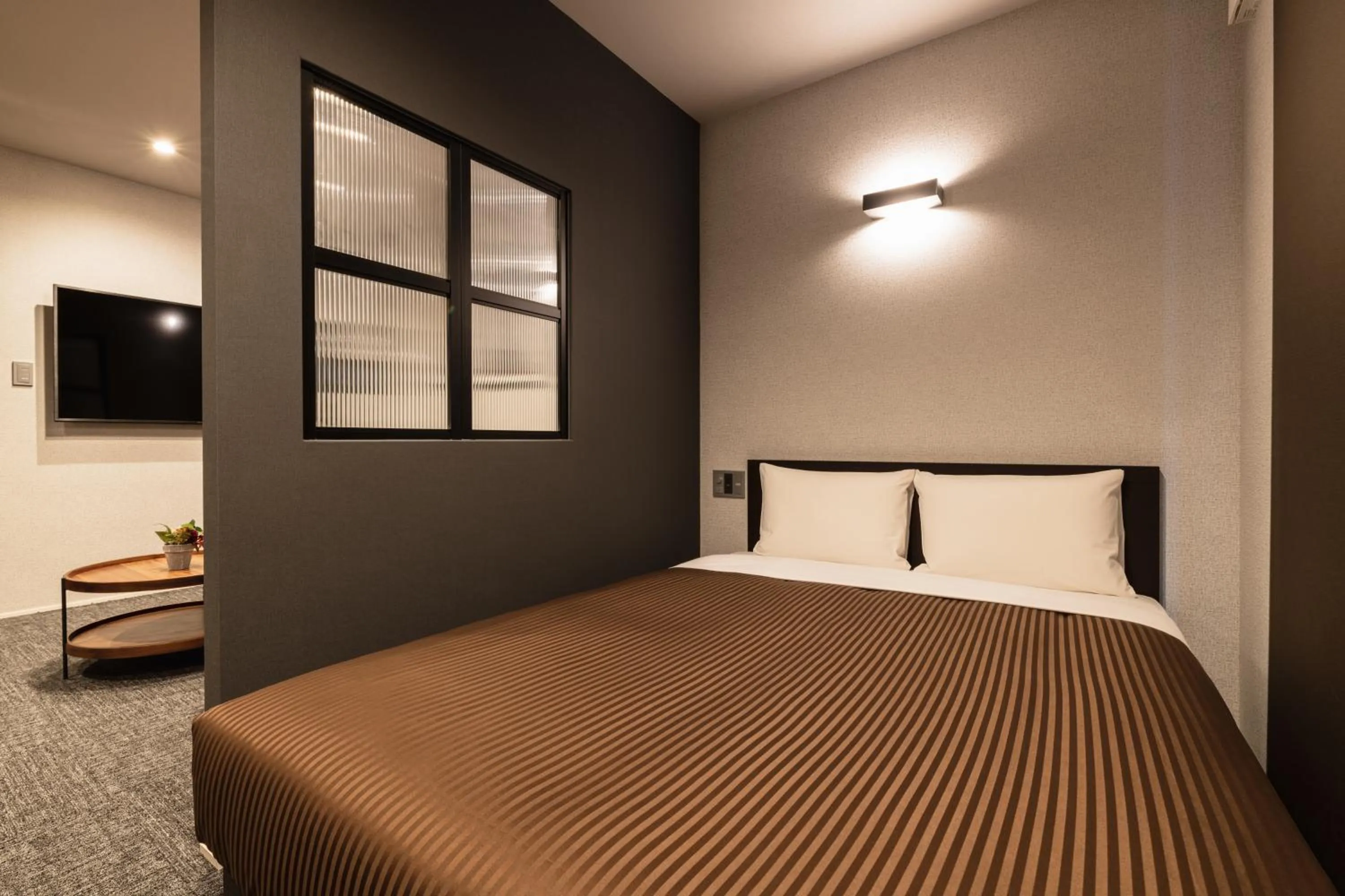 Bed in GRAND BASE Hakata Premium