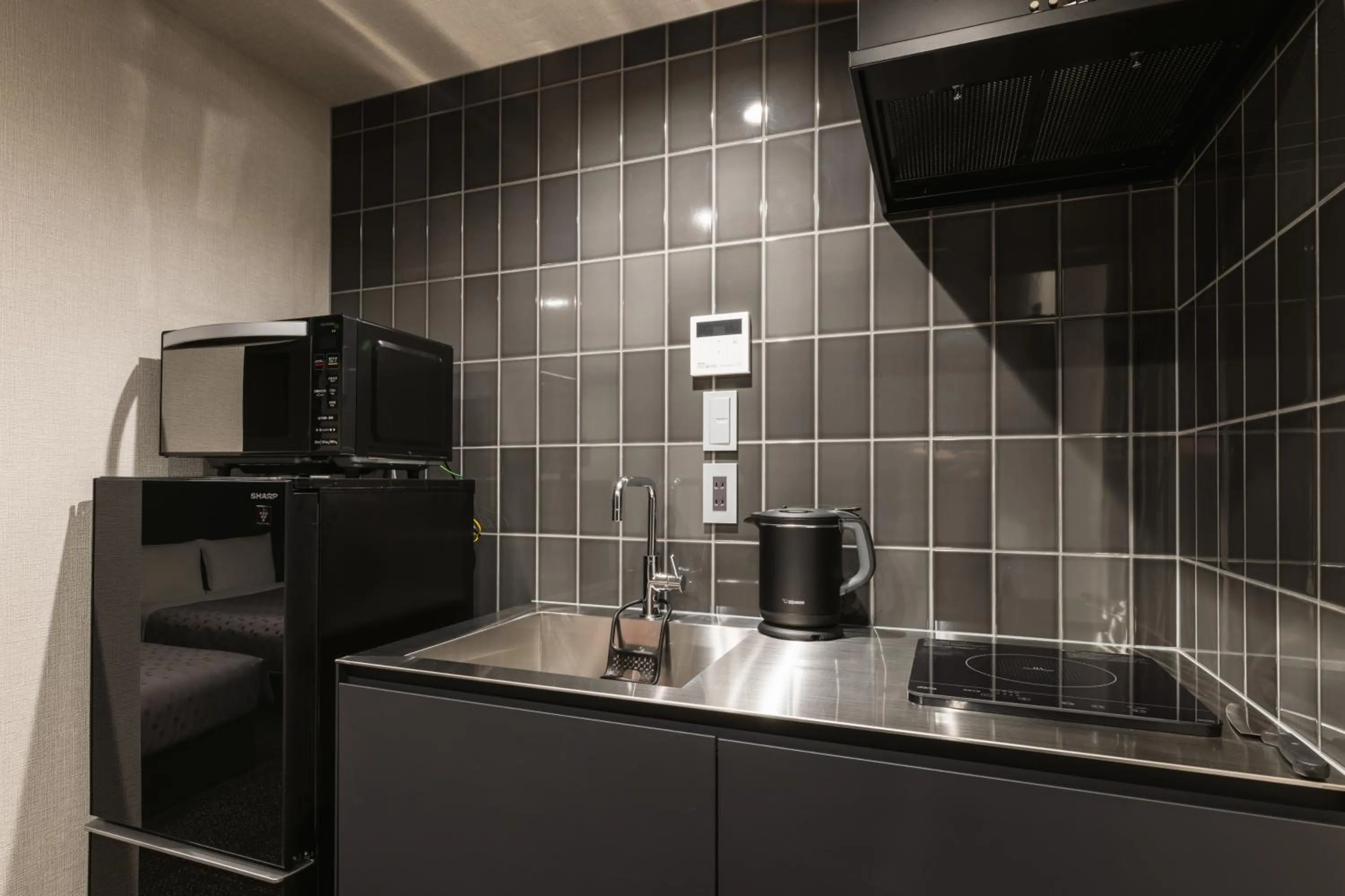 Kitchen or kitchenette in GRAND BASE Hakata Premium