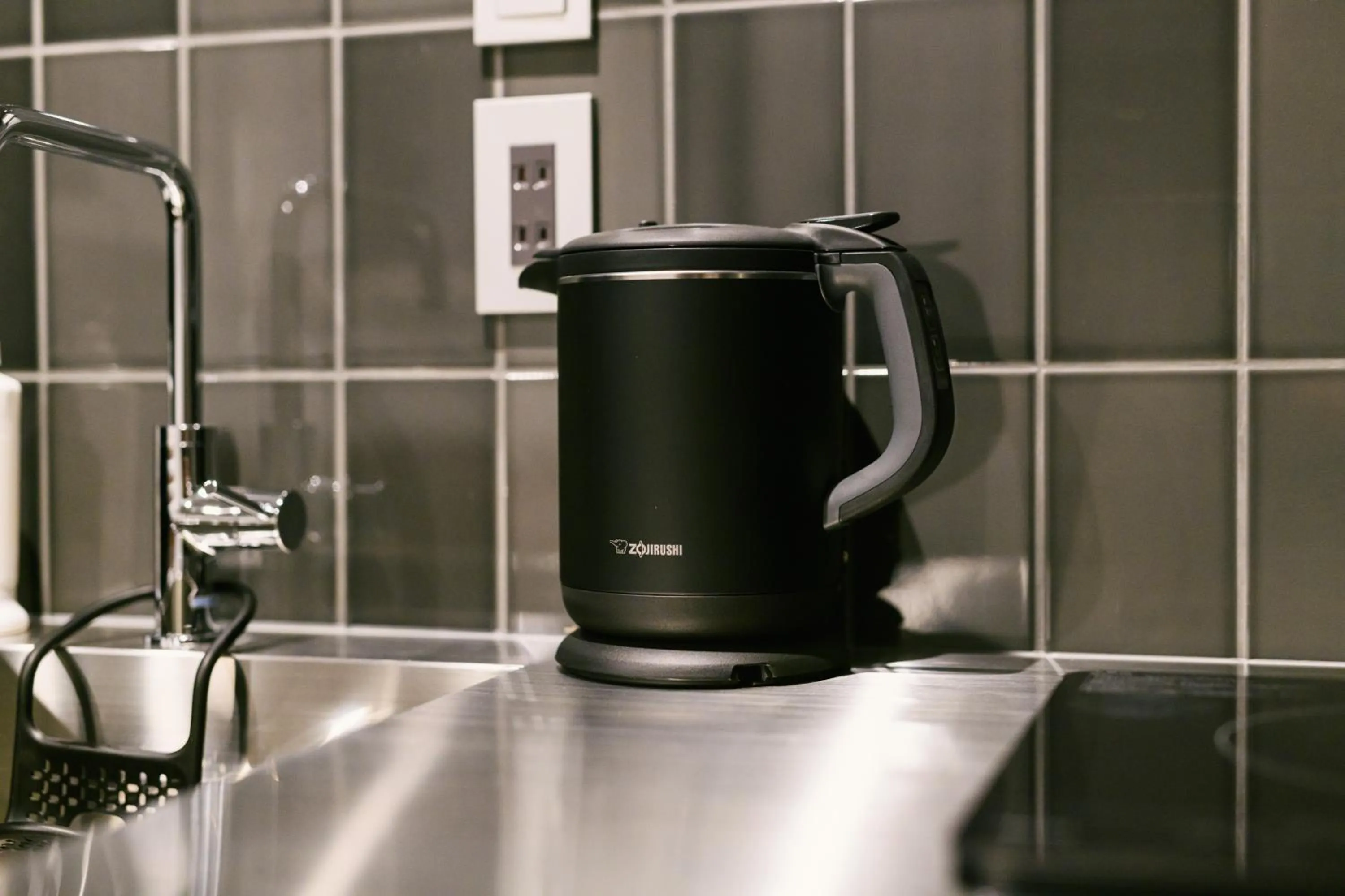 Kitchen or kitchenette in GRAND BASE Hakata Premium