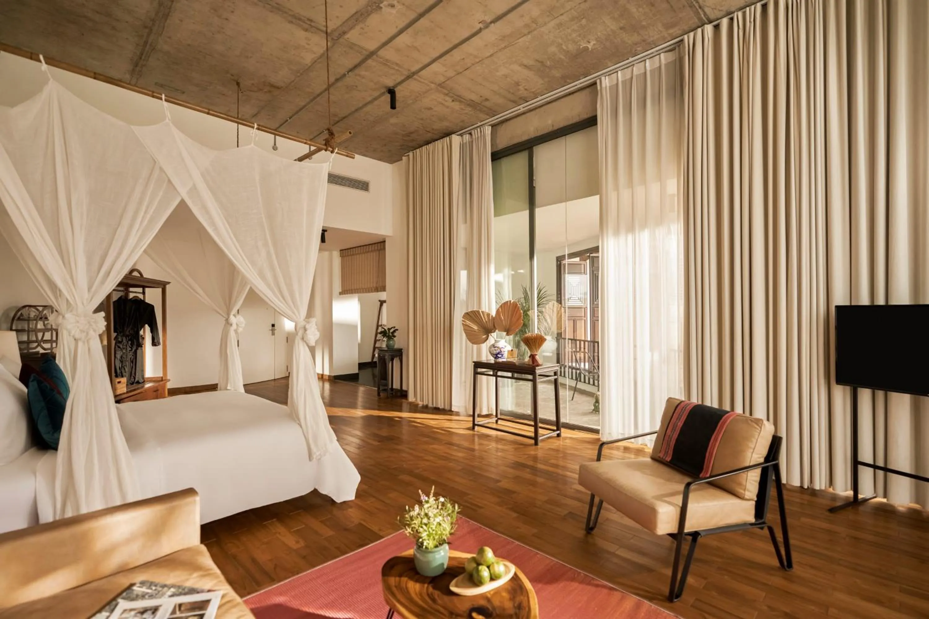 Seating area, Bed in aNhill Boutique