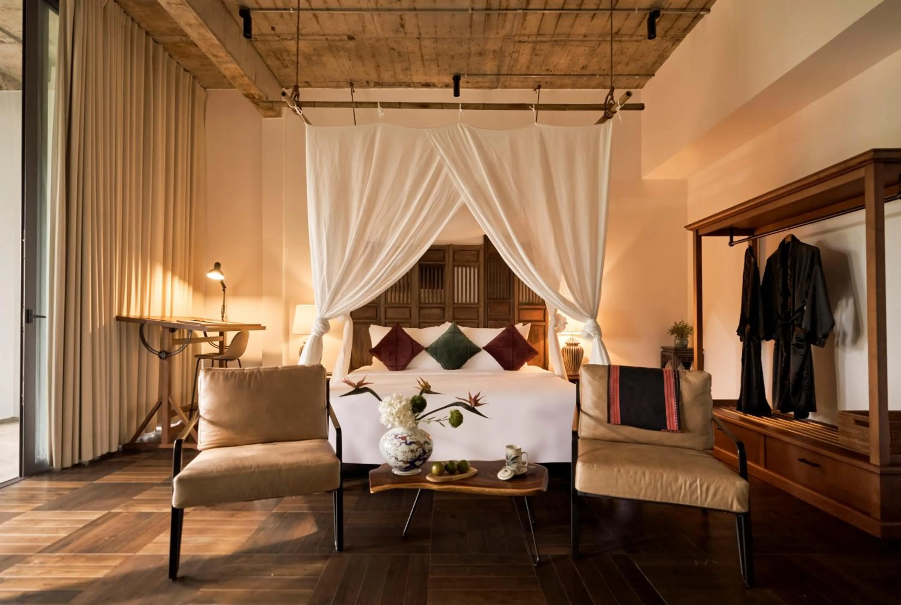 Seating area, Bed in aNhill Boutique