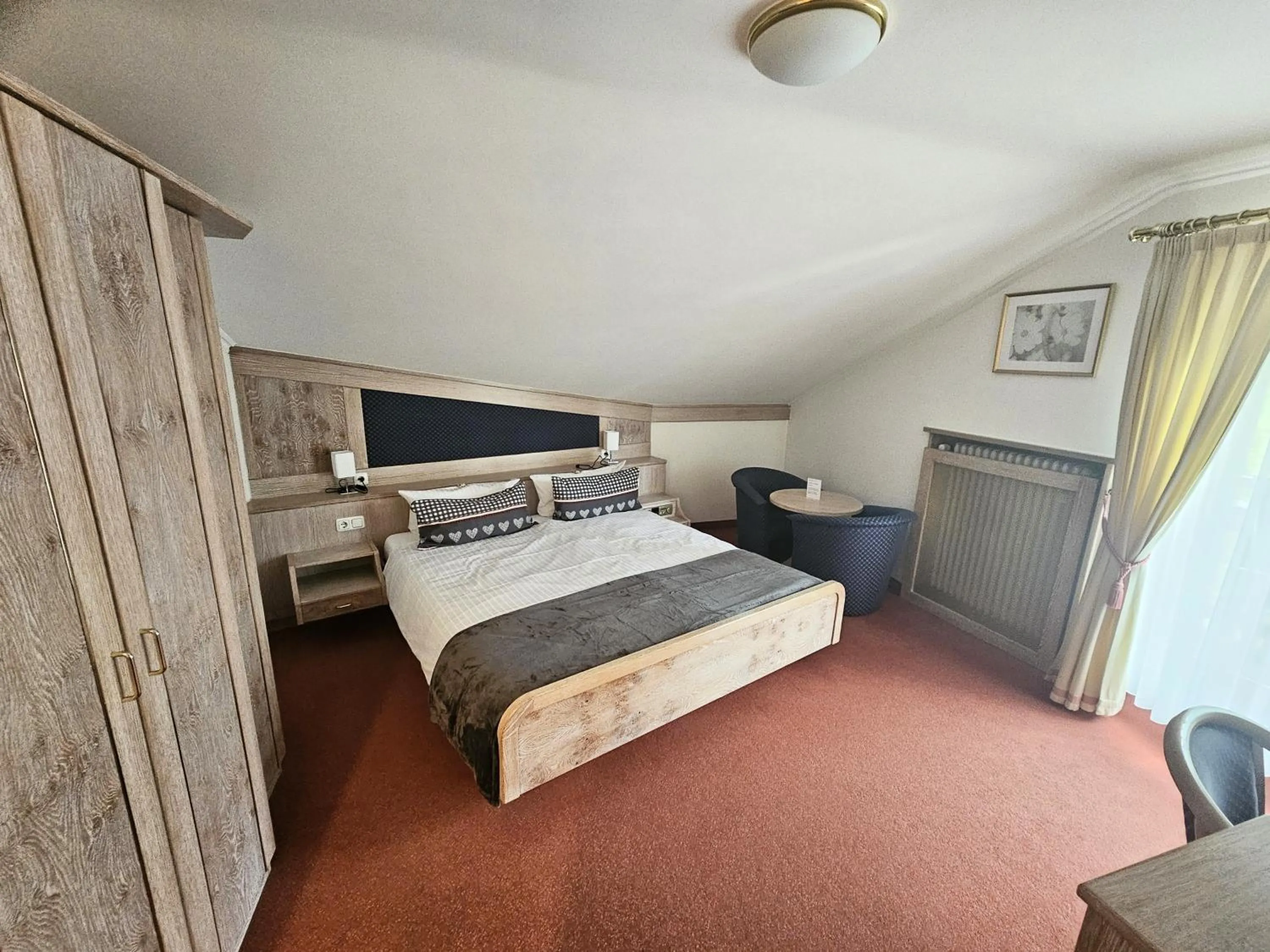 Photo of the whole room, Bed in Hotel Quellenhof