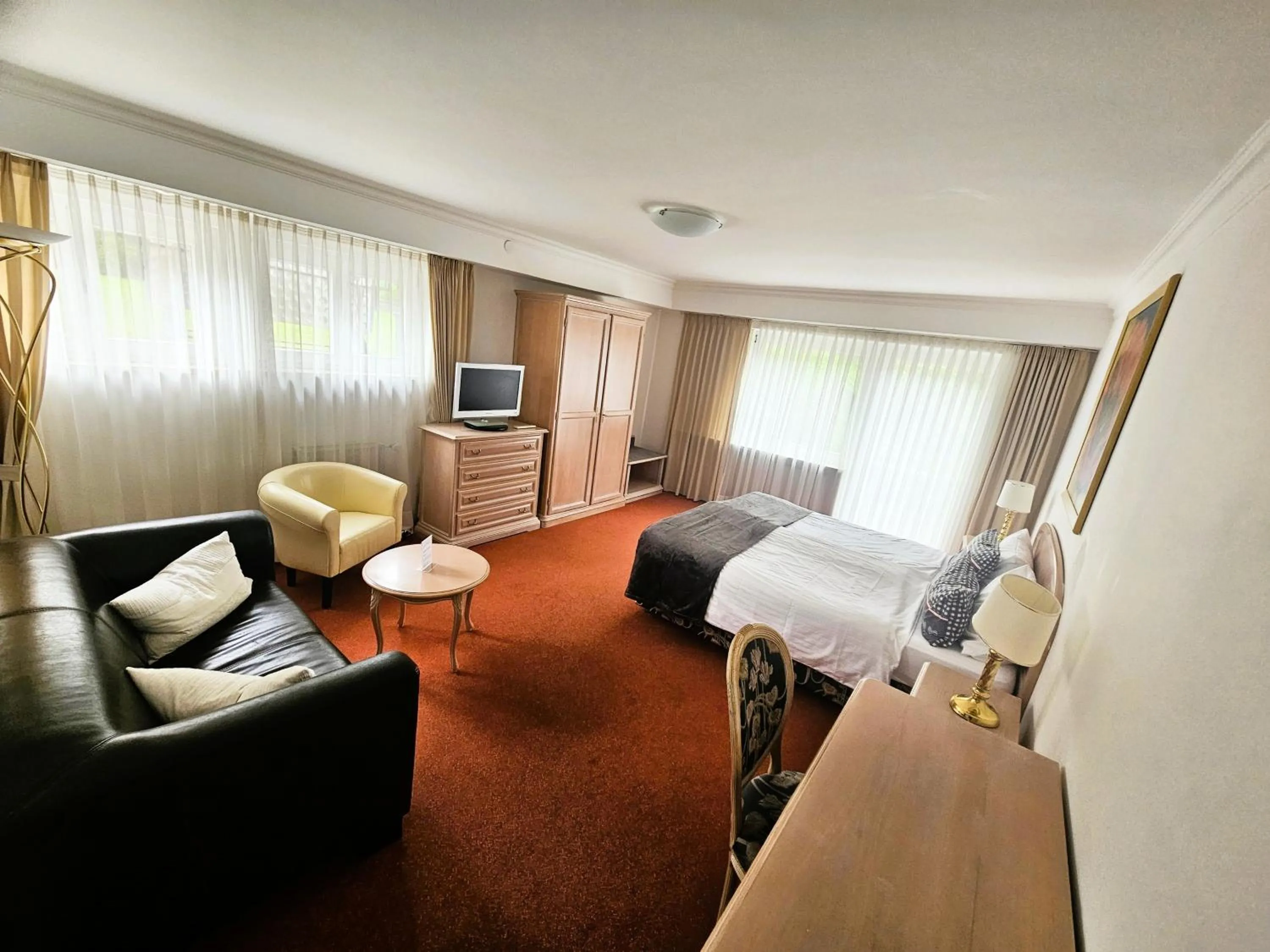 Photo of the whole room, Bed in Hotel Quellenhof