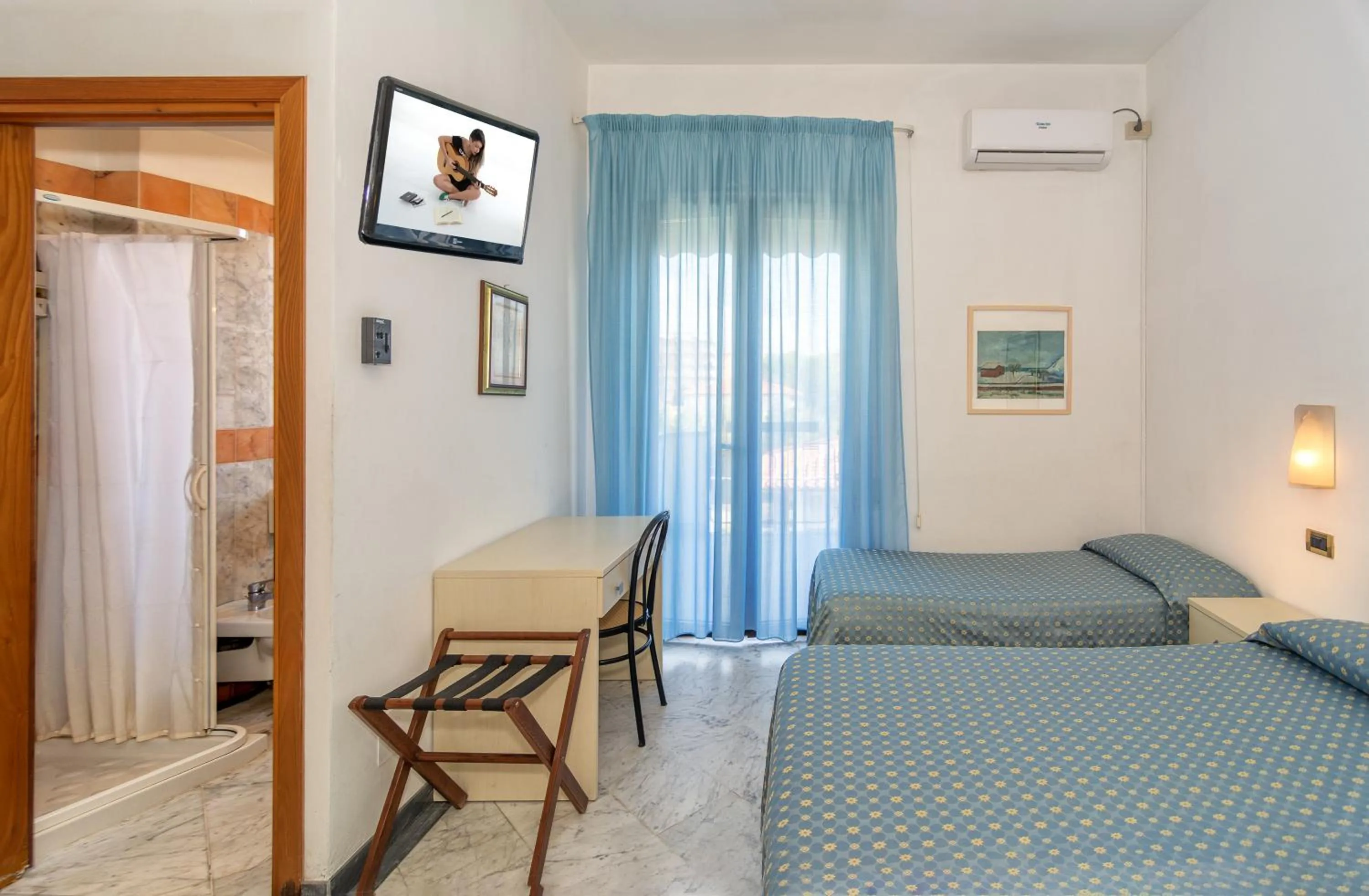 Bed in Hotel Mariotti