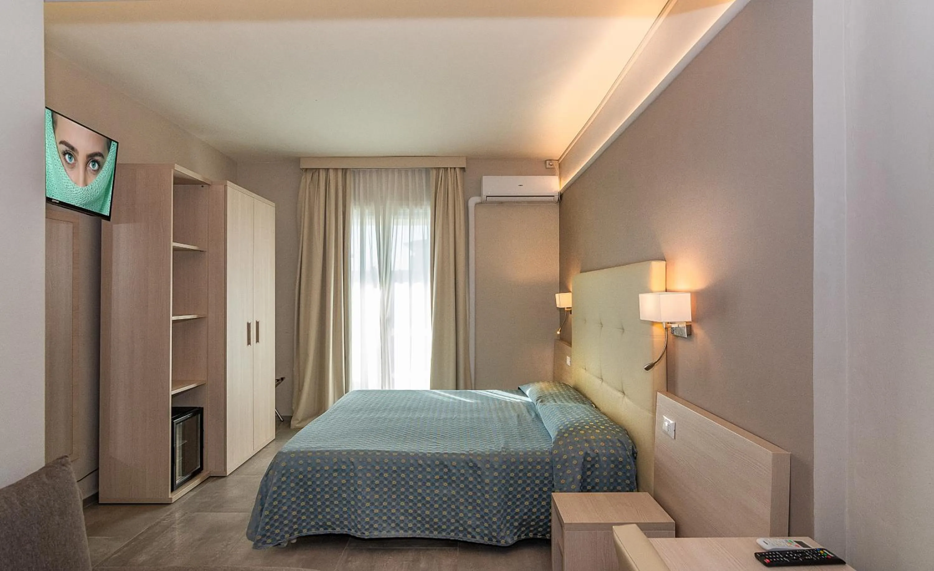 Bed in Hotel Mariotti