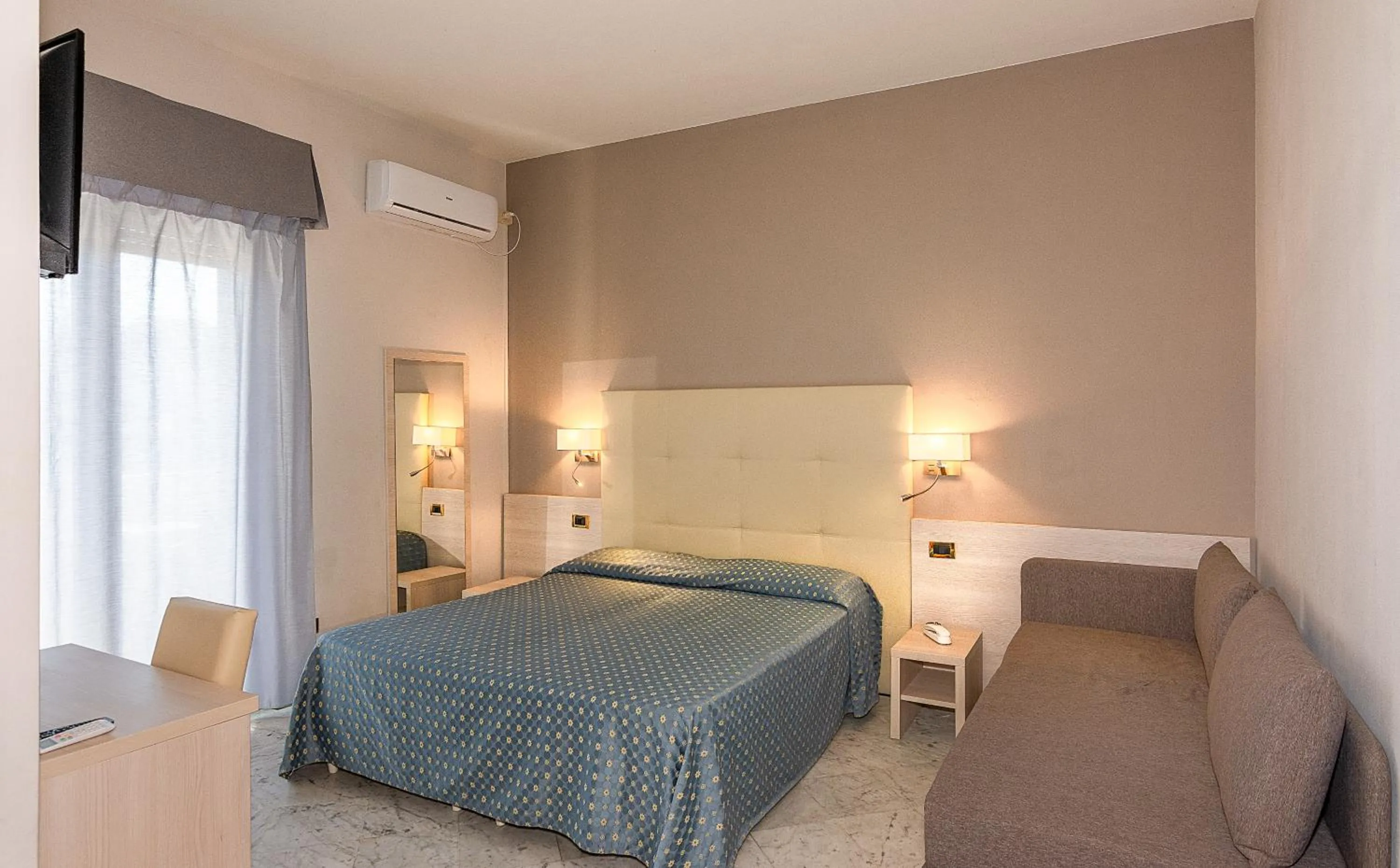 Bed in Hotel Mariotti