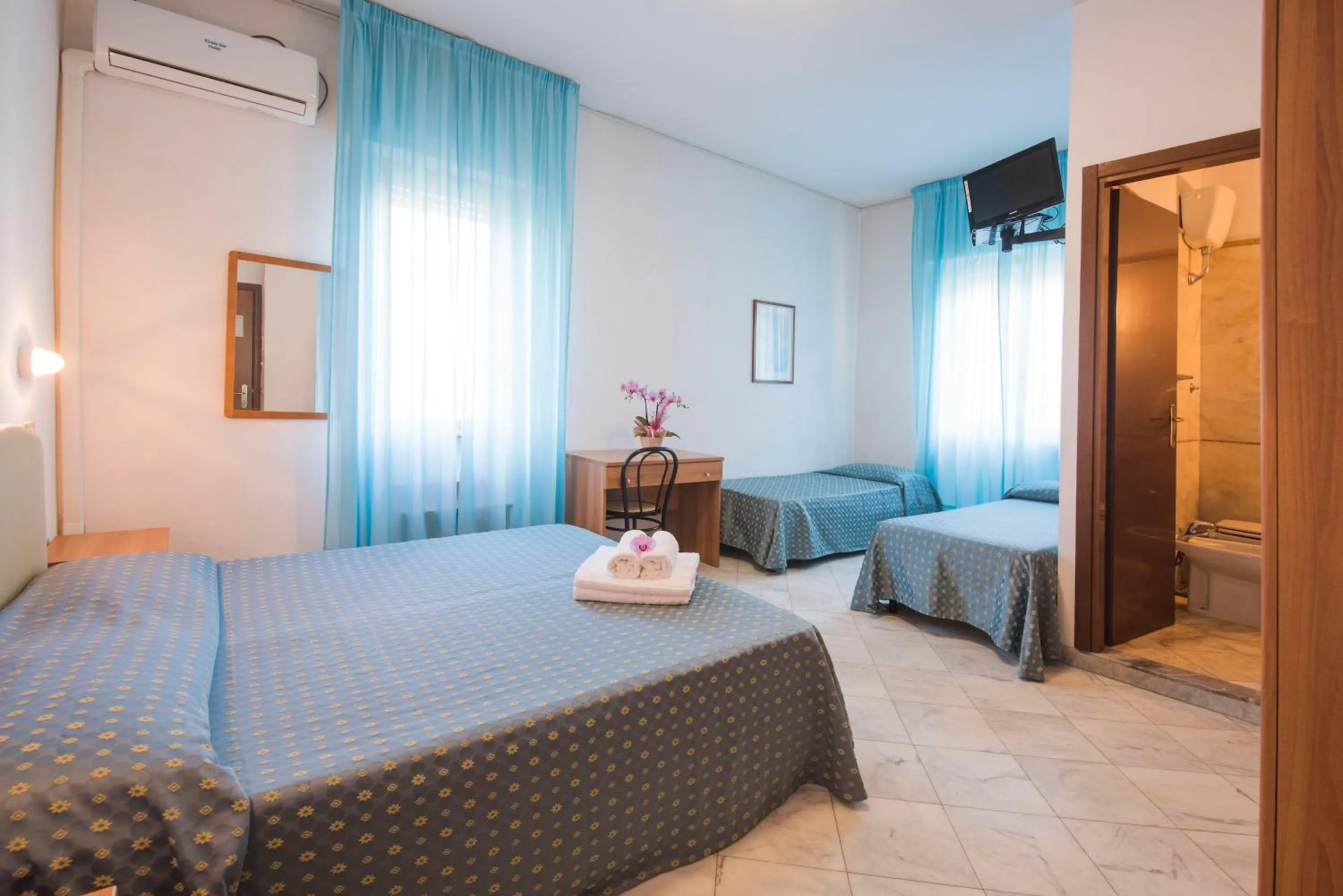 Bed in Hotel Mariotti