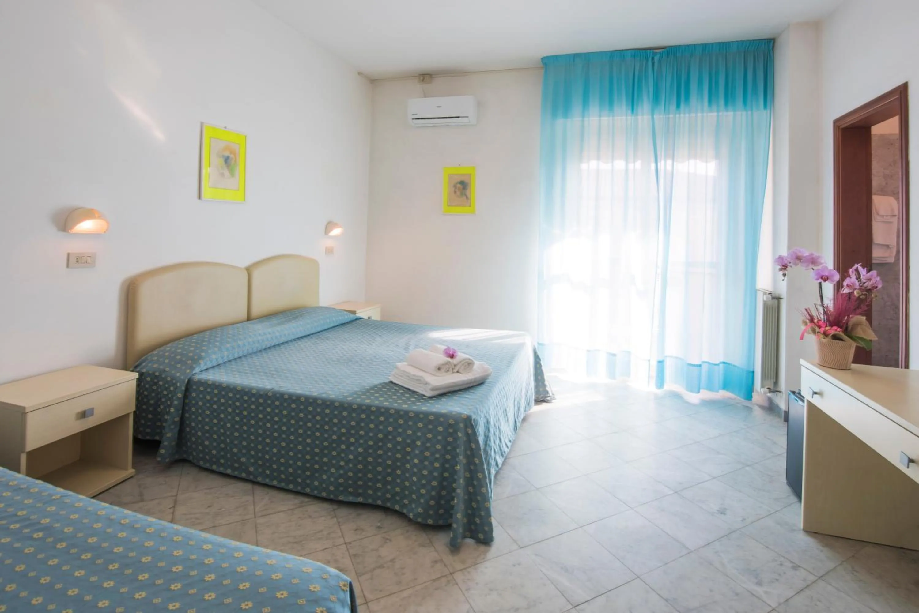 Bed in Hotel Mariotti