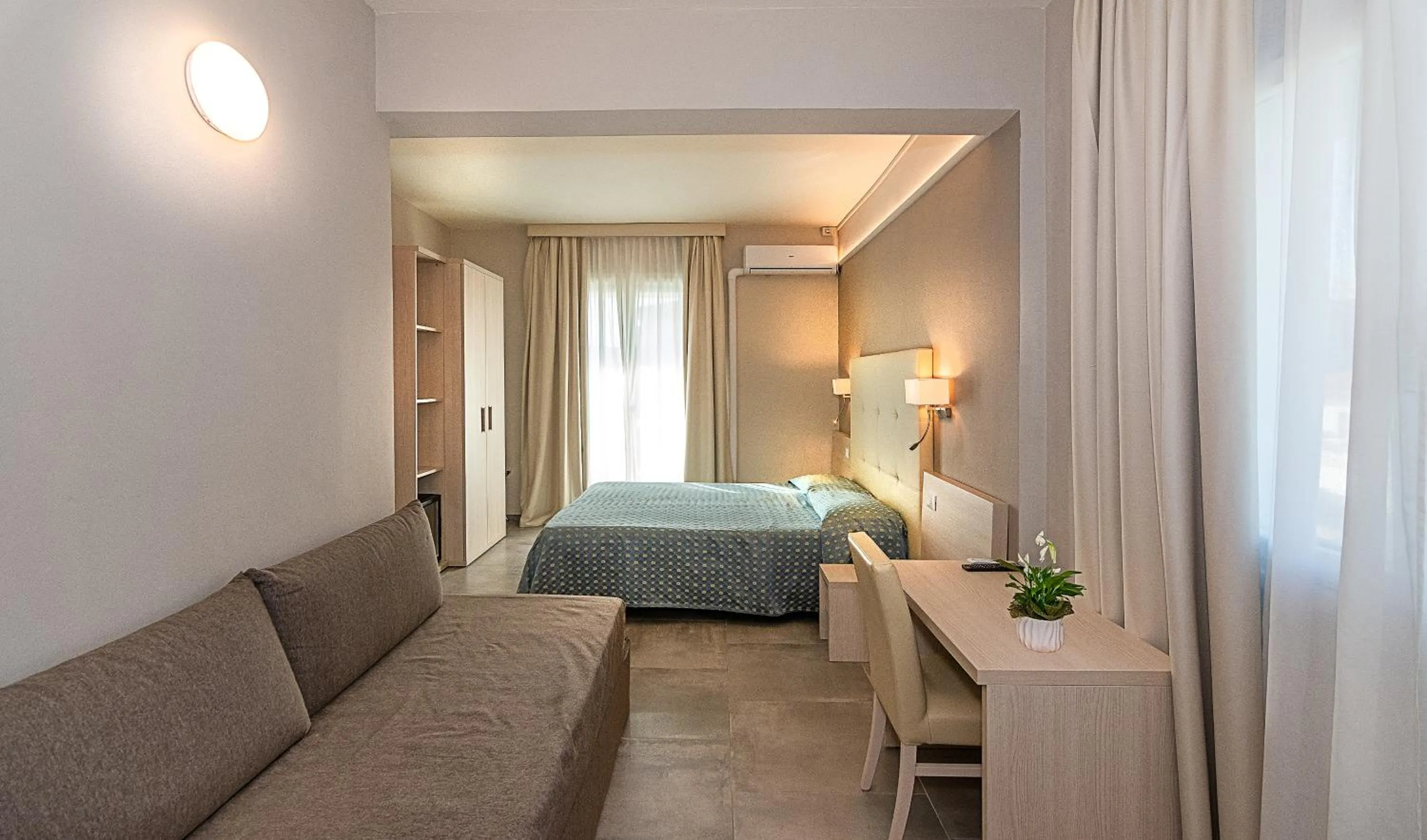 Bed in Hotel Mariotti