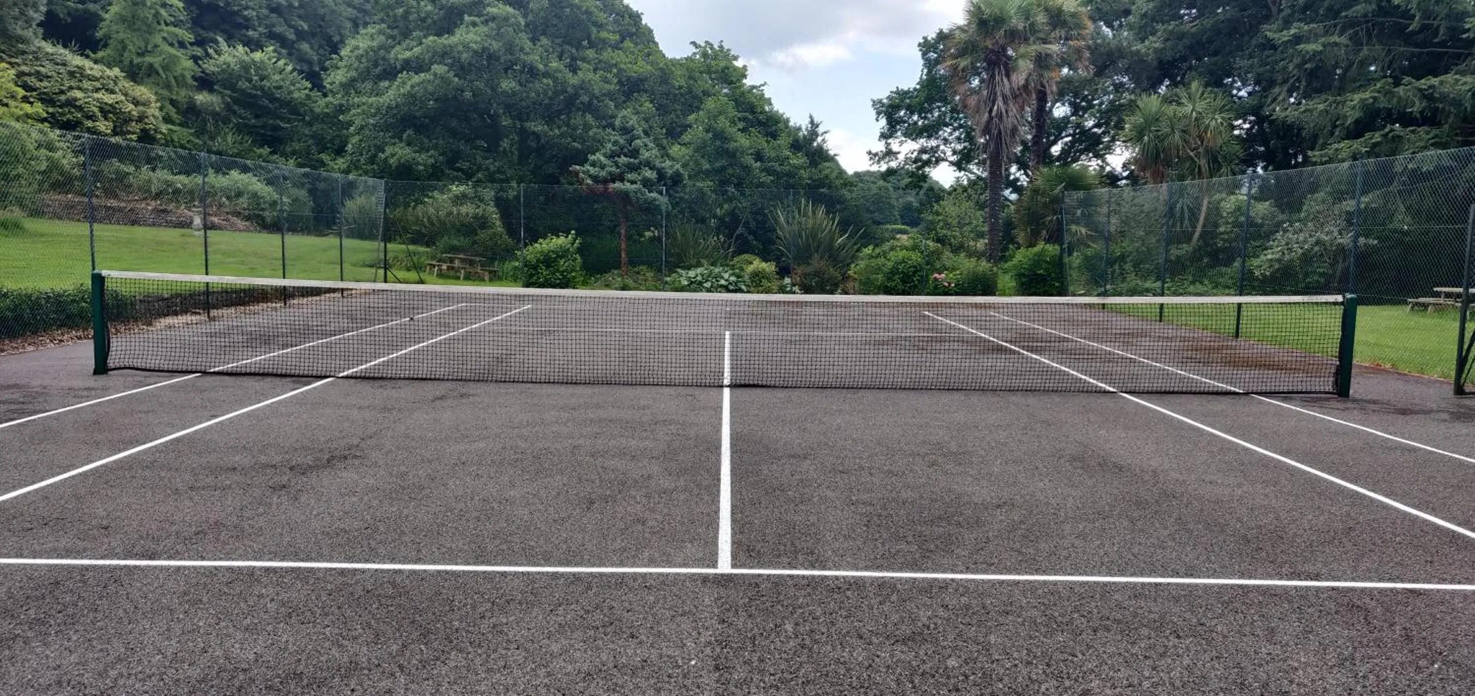 Tennis court in Luxury Bed And Breakfast at Bossington Hall in Exmoor, Somerset