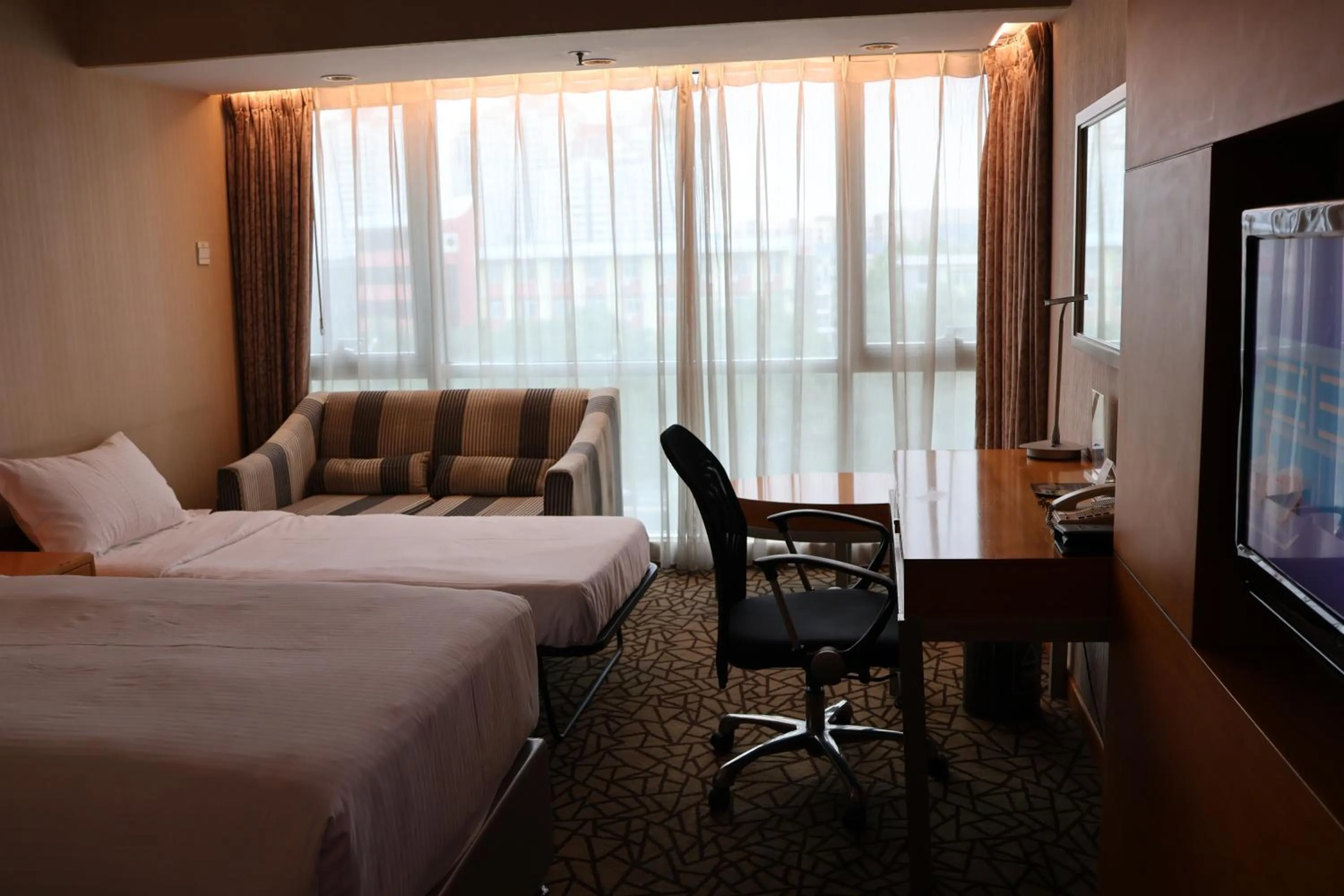 Bed in Park Plaza Beijing Science Park