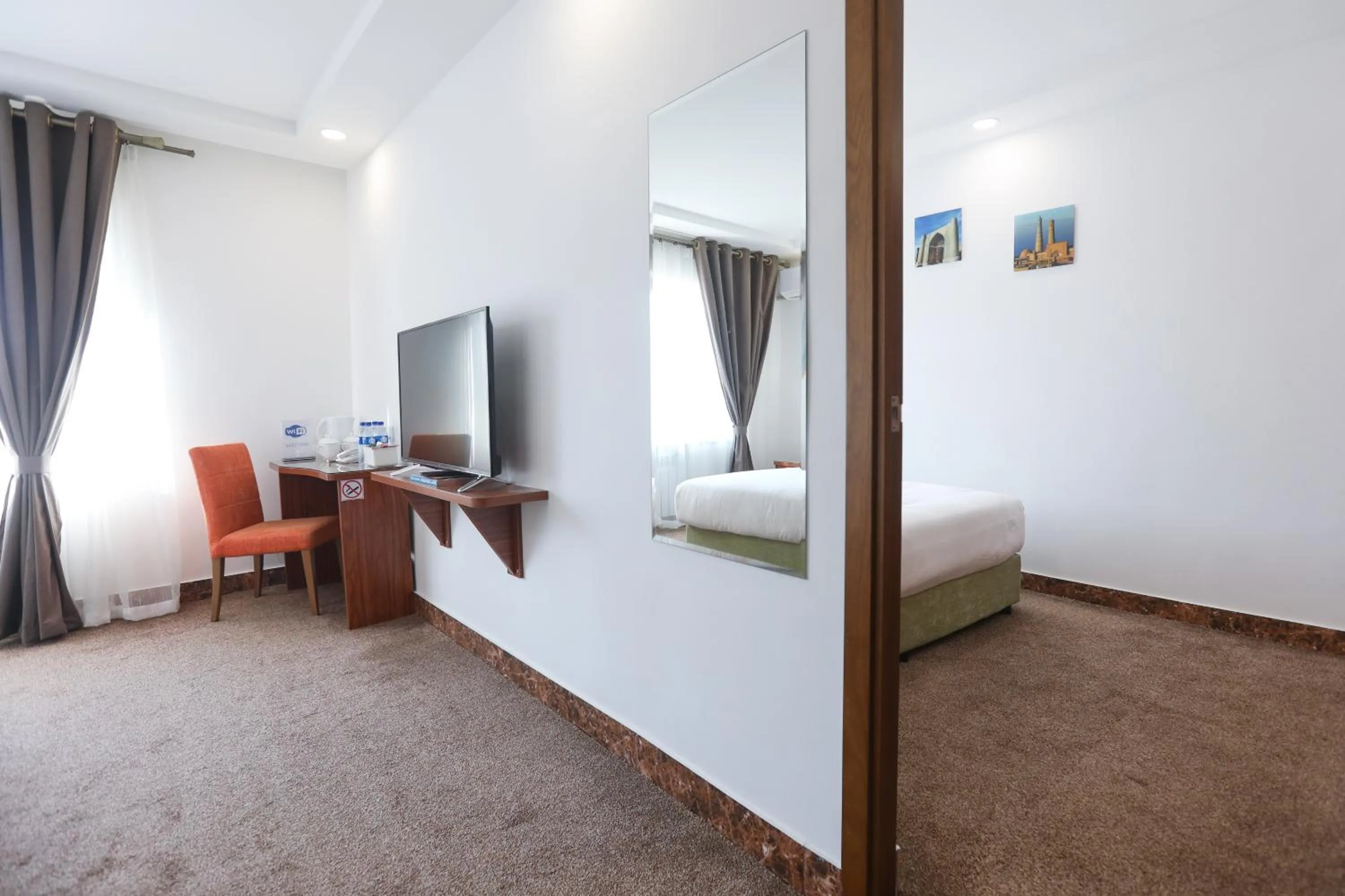 Bed in Sunrise Hotel