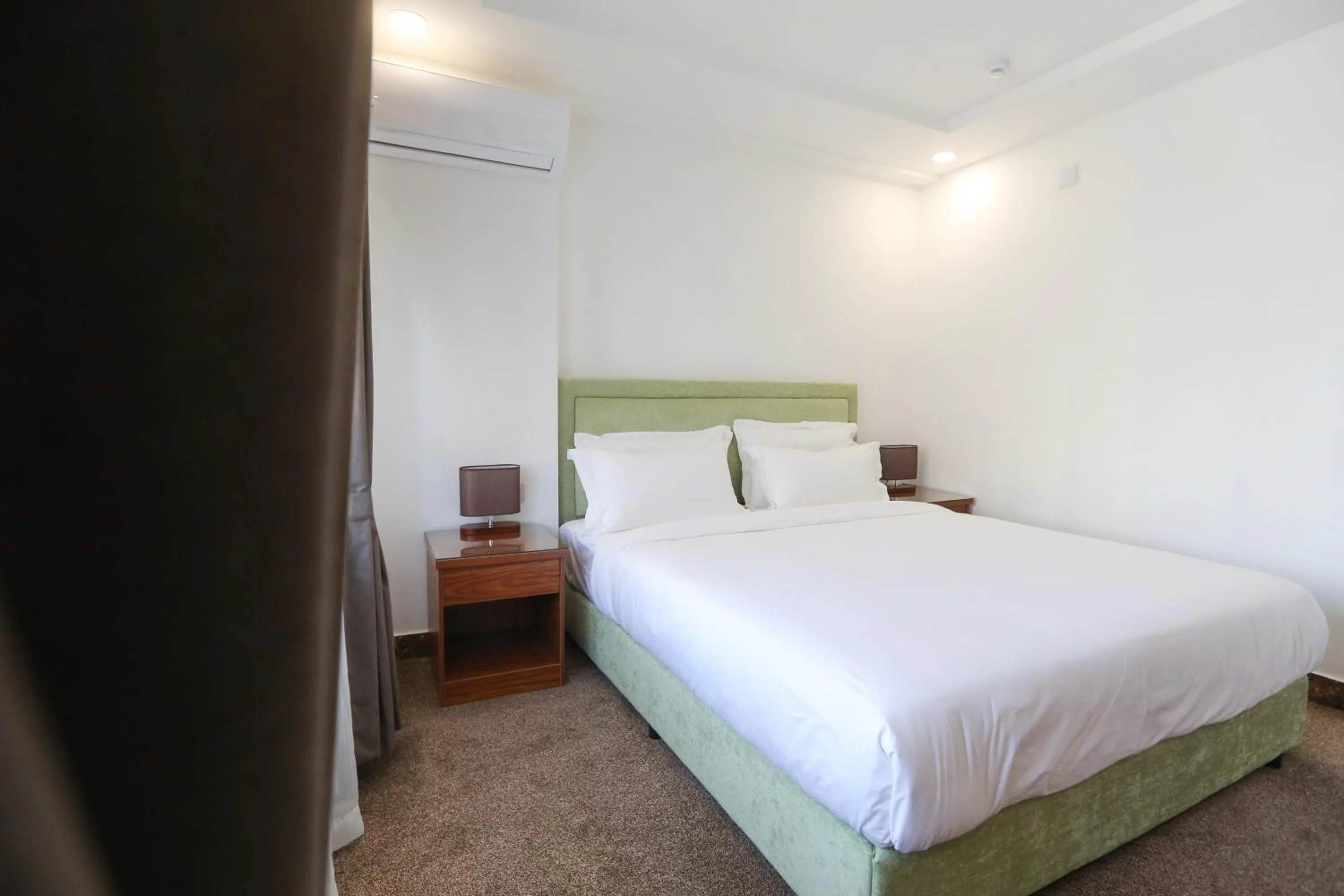 Bed in Sunrise Hotel