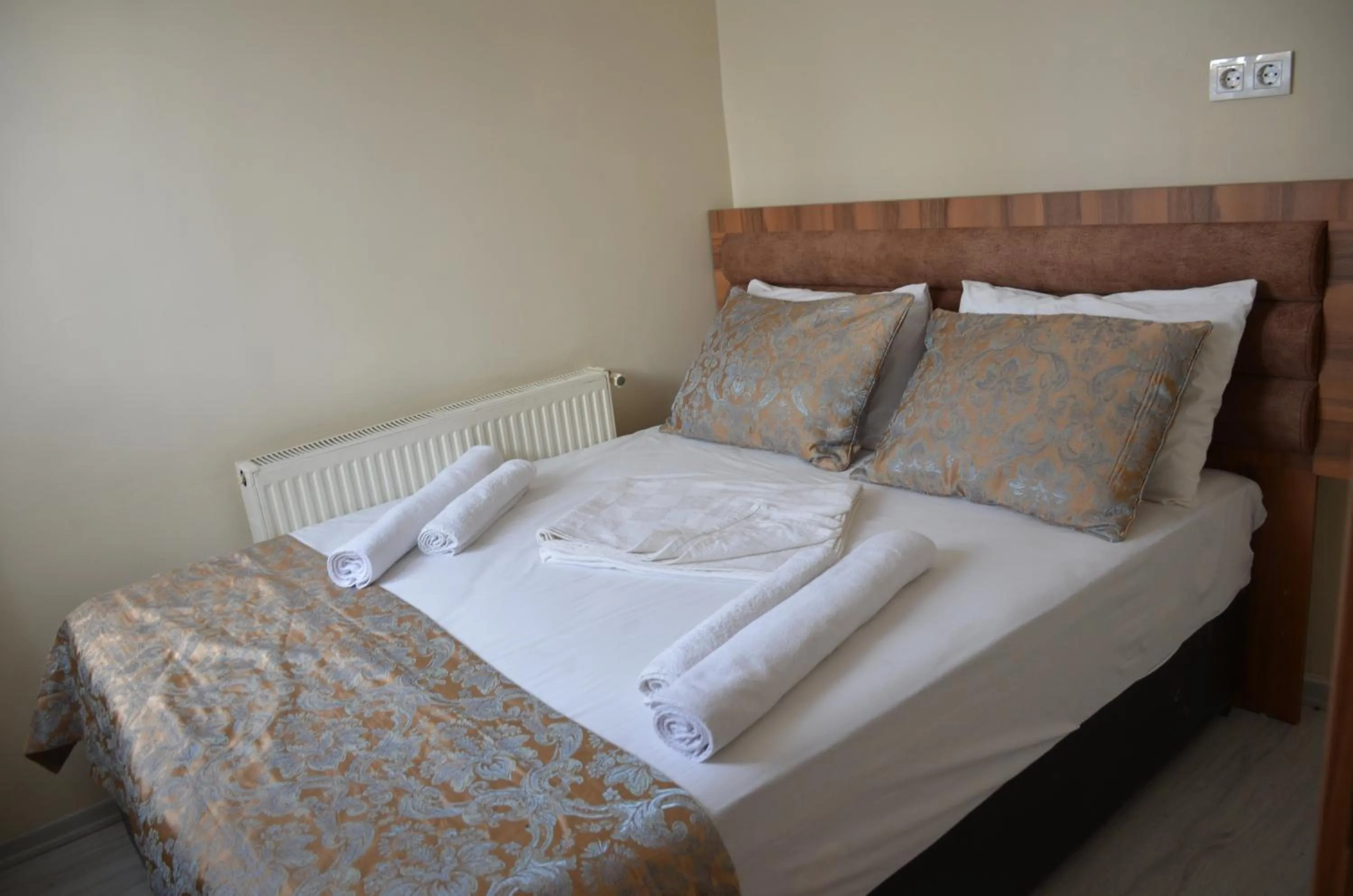 Bed in TABRİZ HOTEL