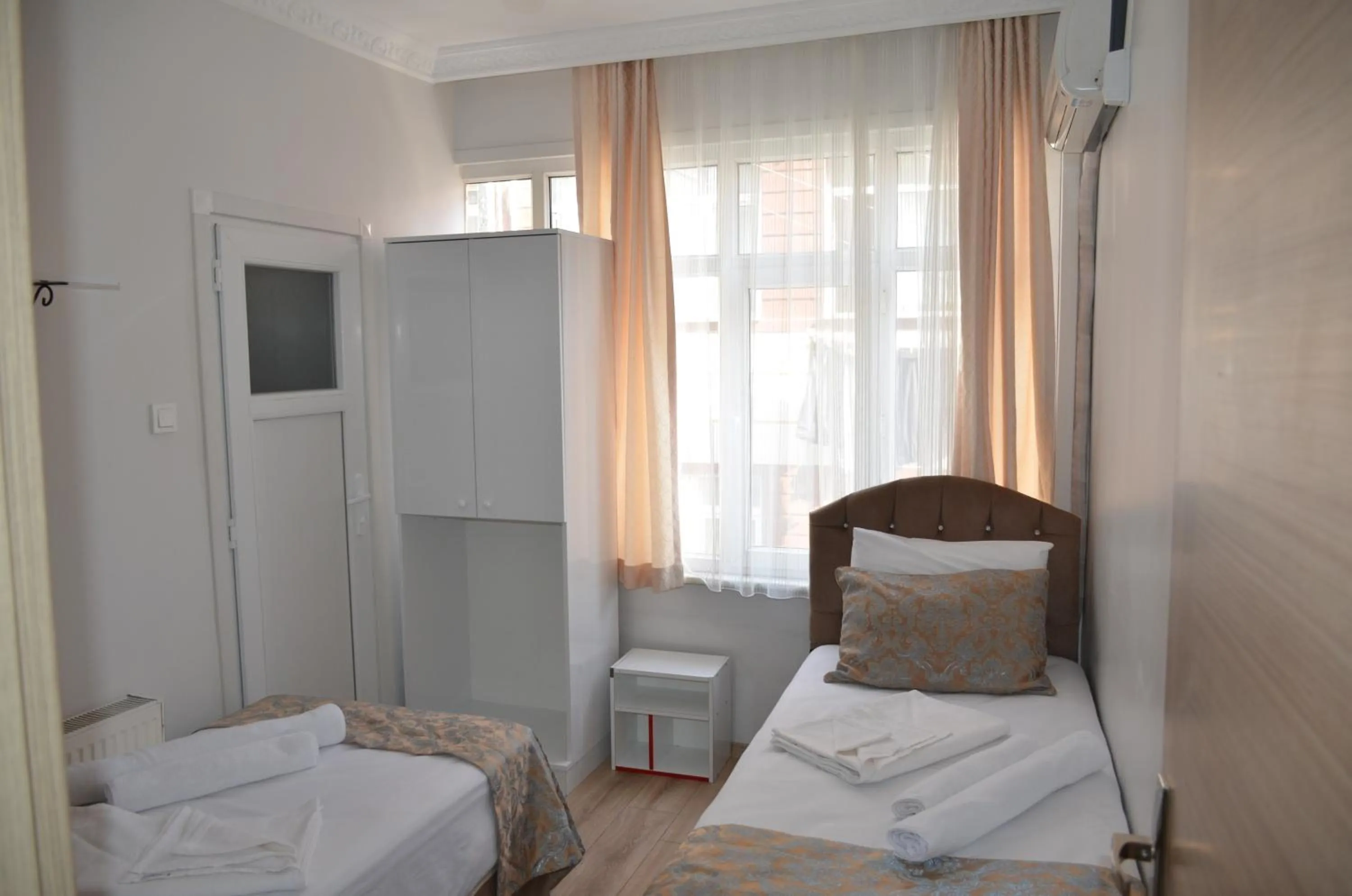 Bed in TABRİZ HOTEL