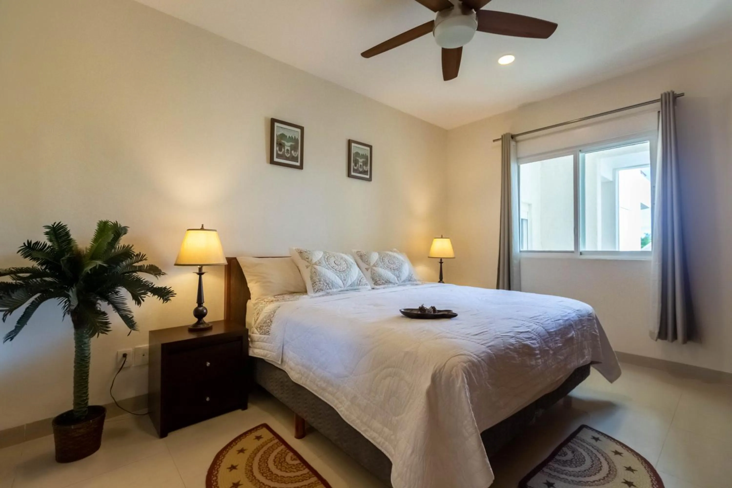 Bed in Sunset Condo 104 Puerta al Mar Isla Mujeres Mexico