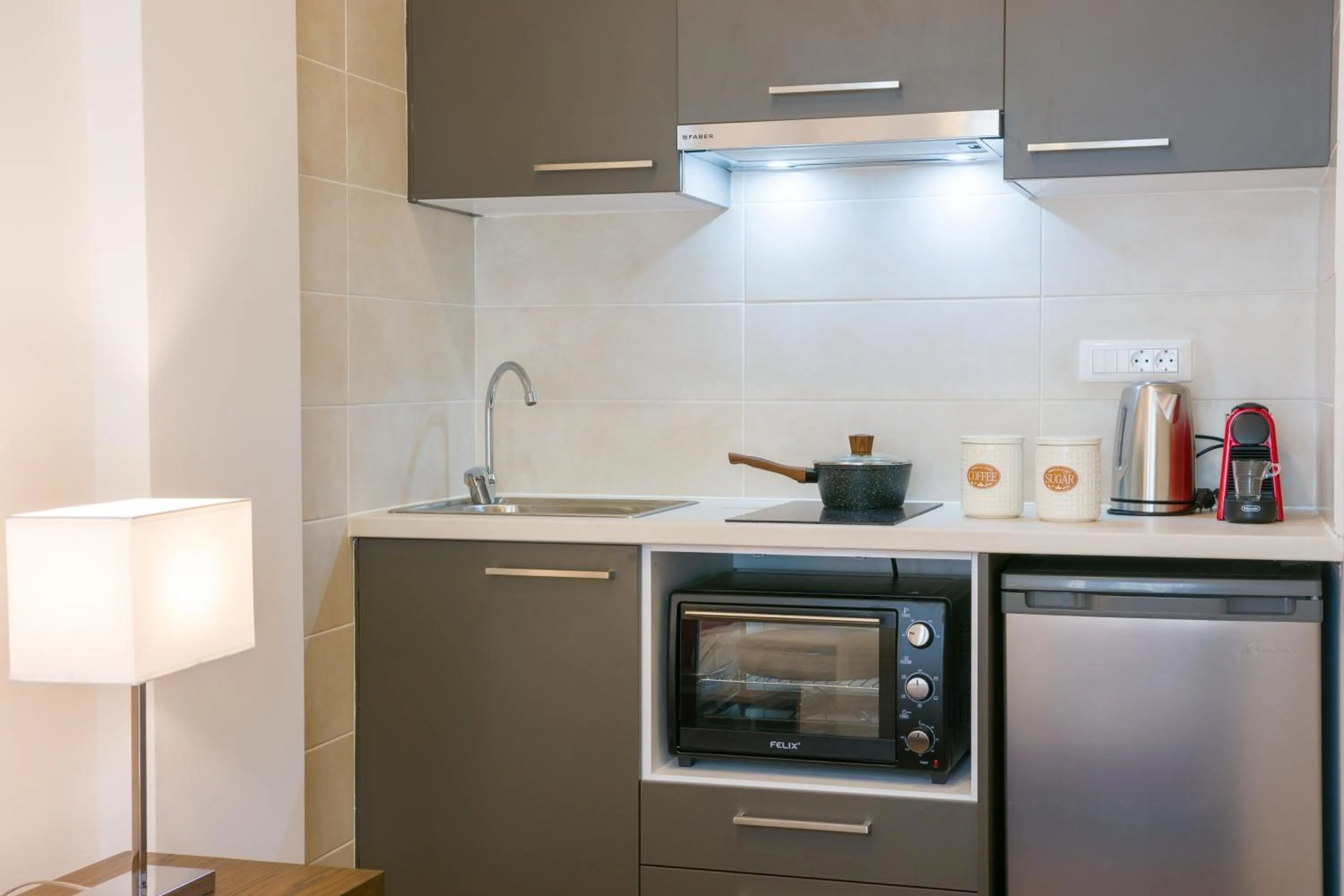 Kitchen or kitchenette in Elounda Colour Apartments