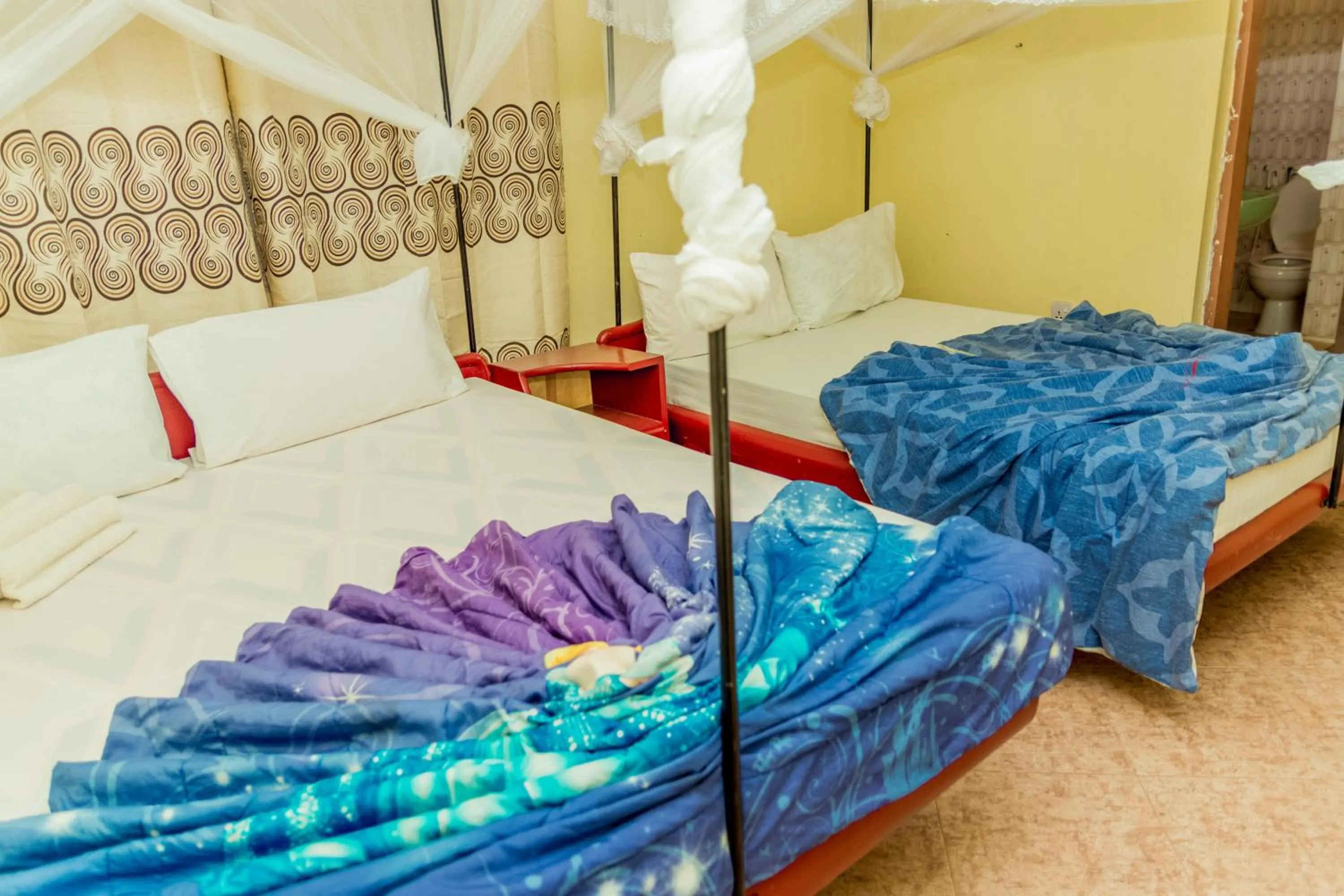 Bedroom in Kilimanjaro Summit Lodge