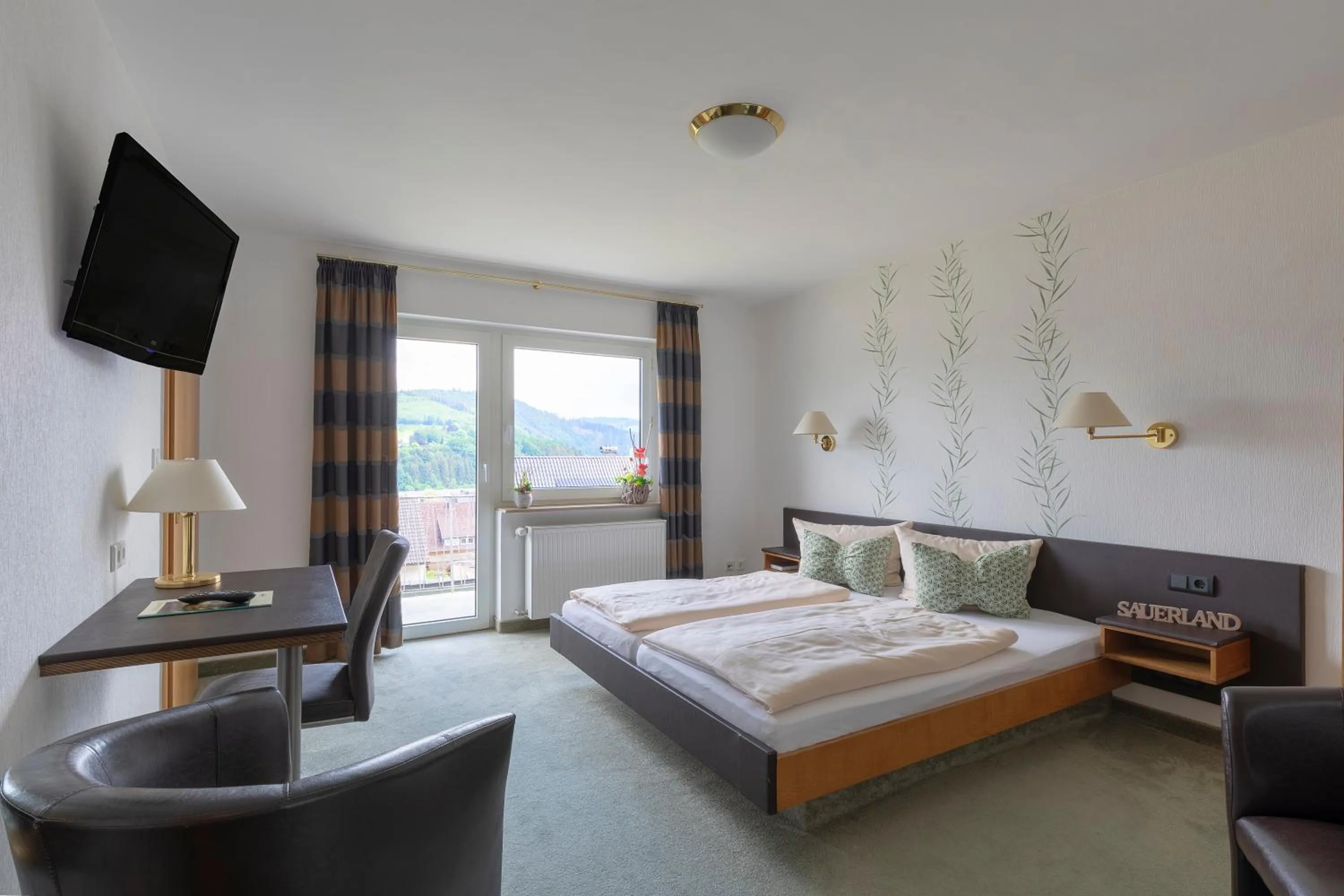 Photo of the whole room, Bed in Luckai Hotel & Restaurant Inhaber Dennis Burmann