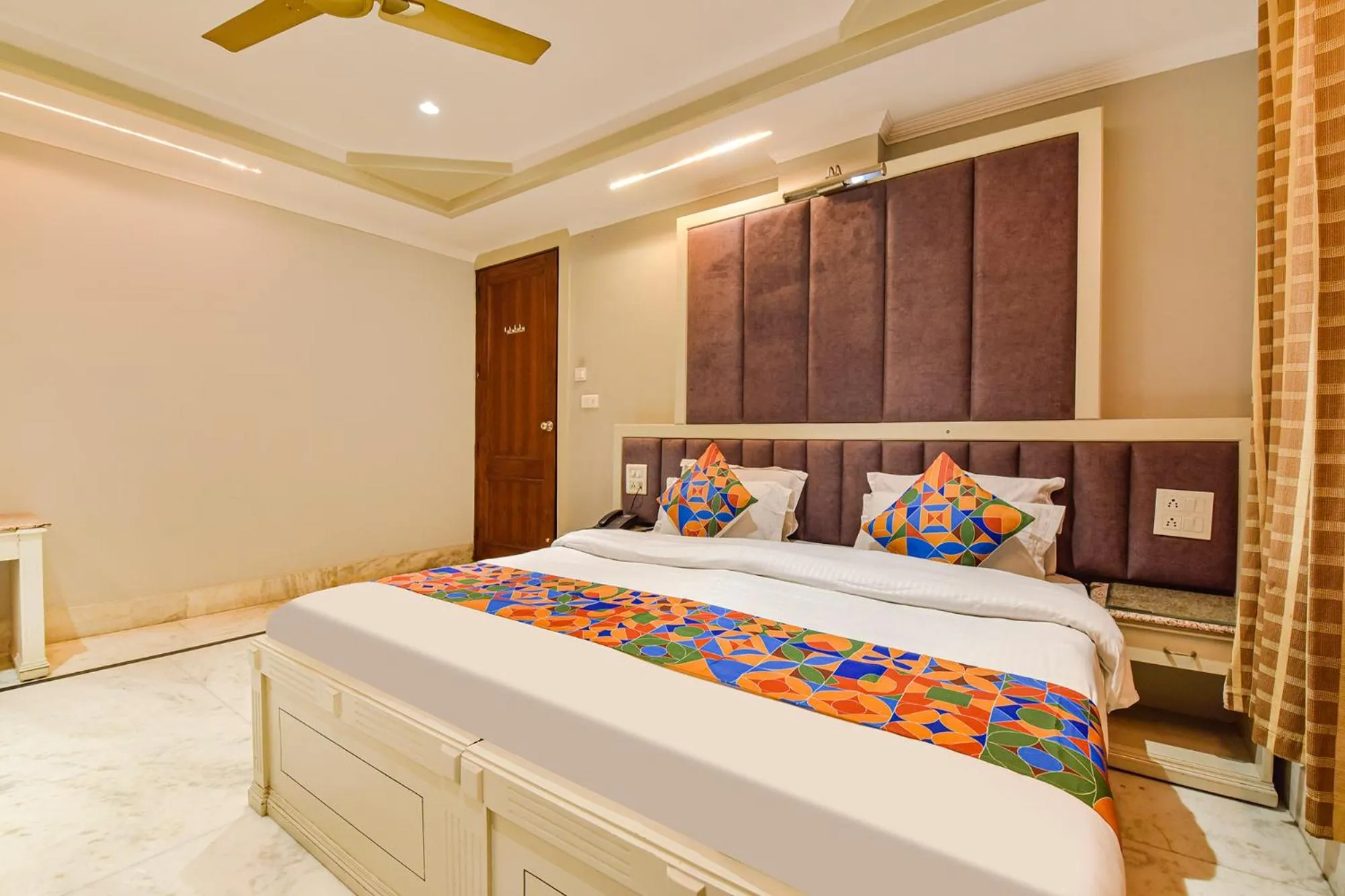 Bed in FabHotel Prem Bihari