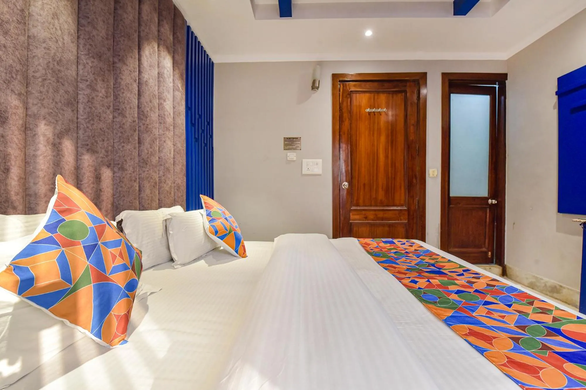 Bed in FabHotel Prem Bihari