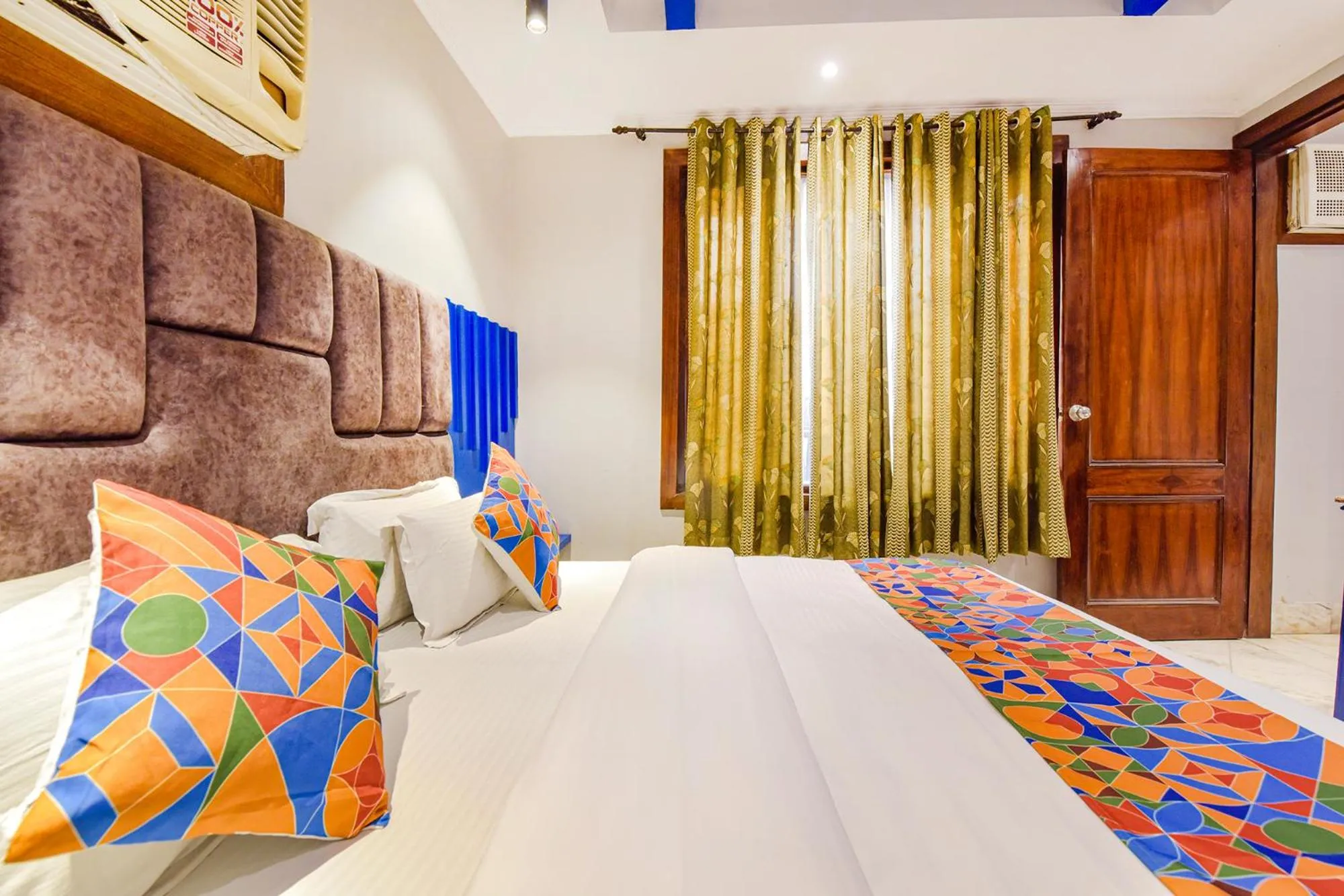 Bed in FabHotel Prem Bihari