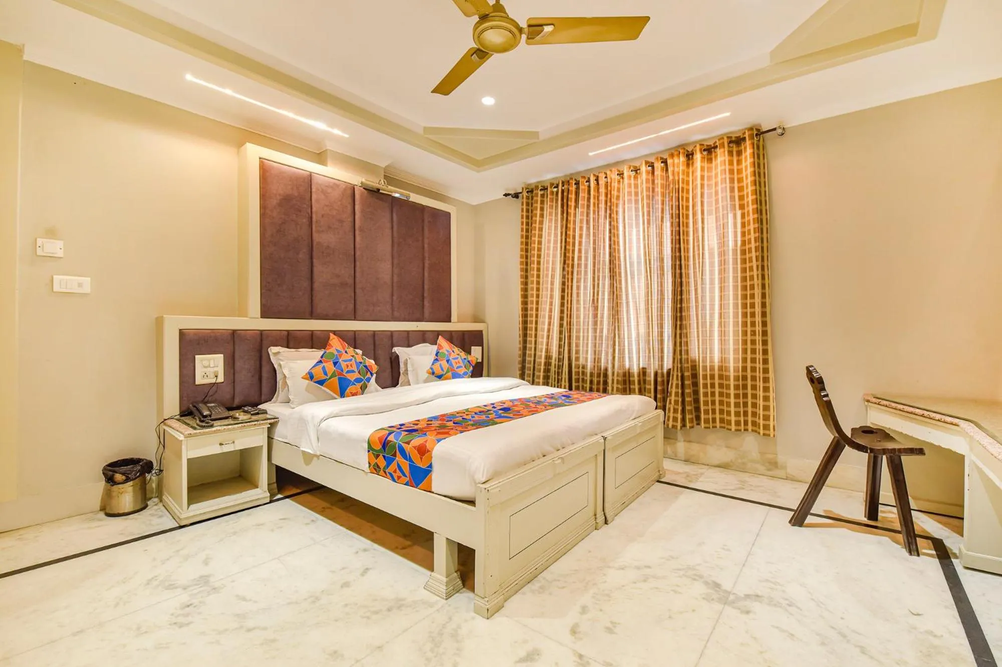 Bed in FabHotel Prem Bihari