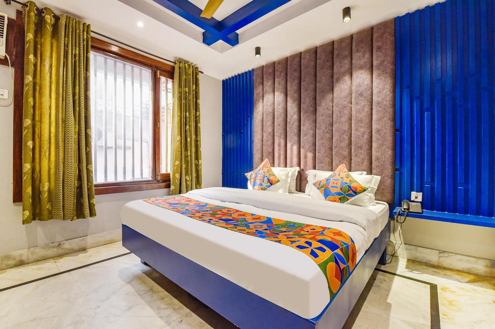 Bed in FabHotel Prem Bihari