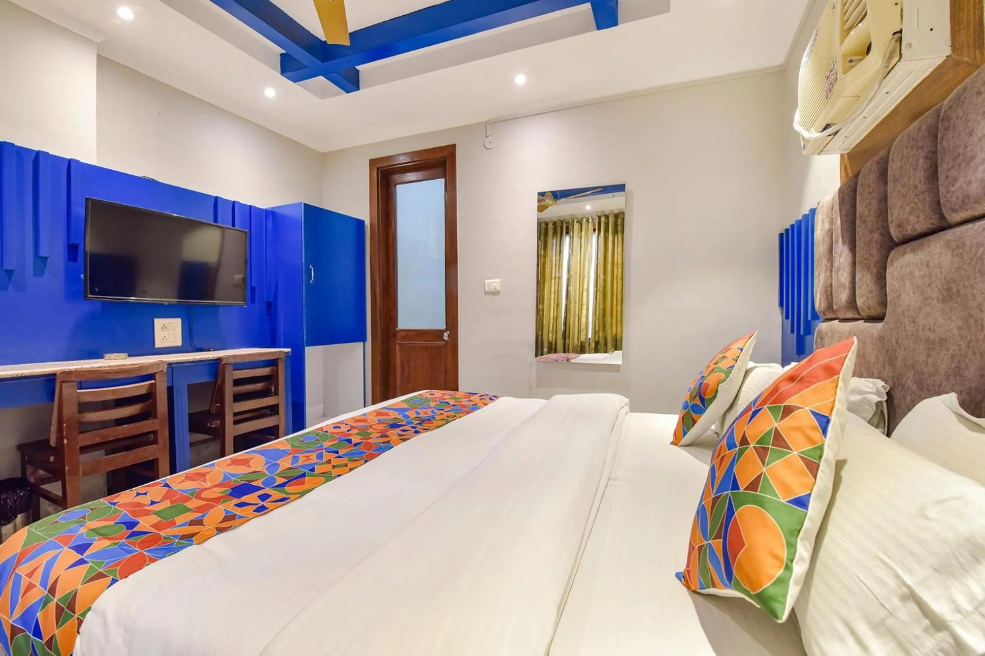 Bed in FabHotel Prem Bihari