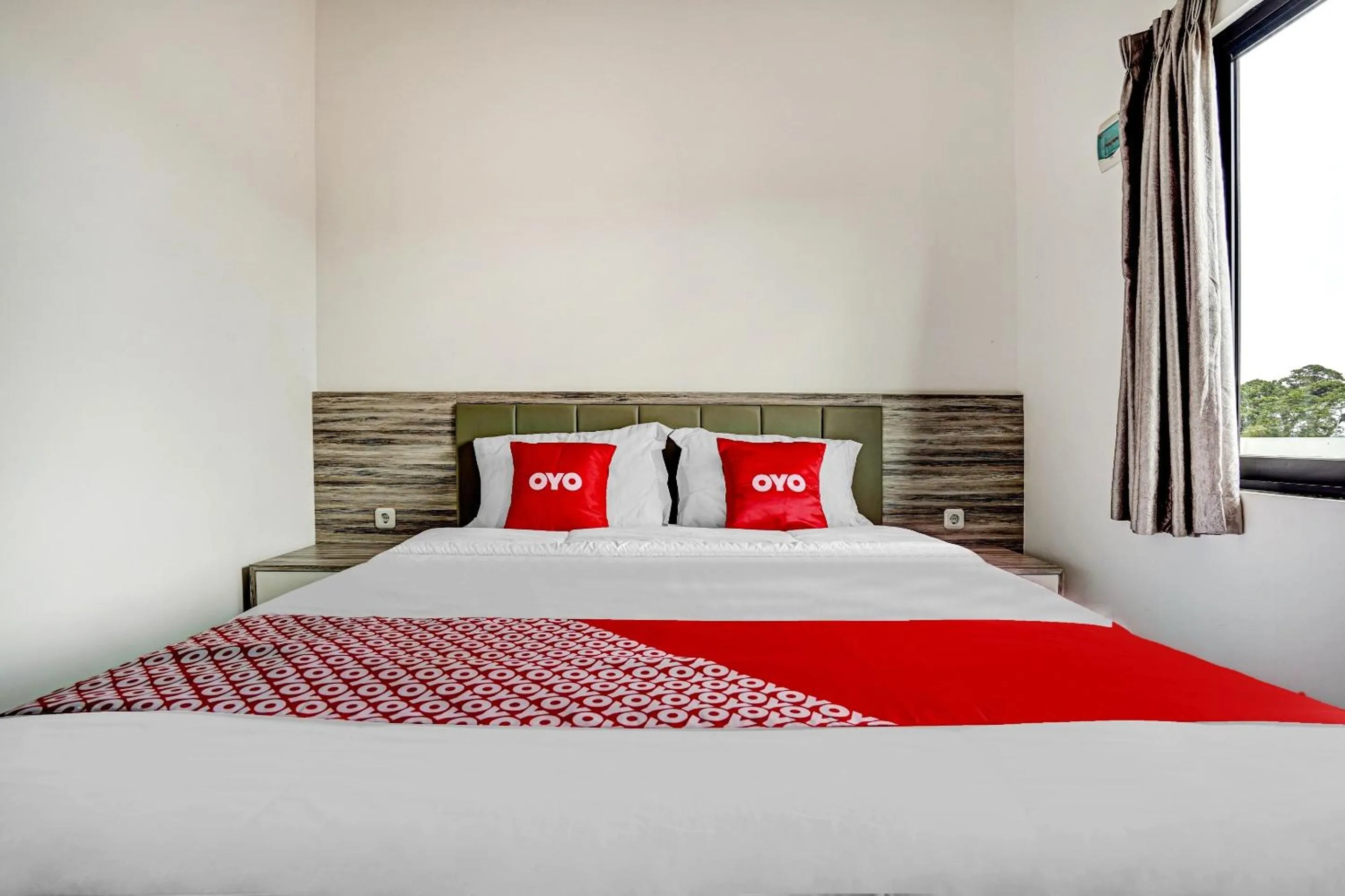 Bedroom in OYO Capital O 90164 La'rissa Residence