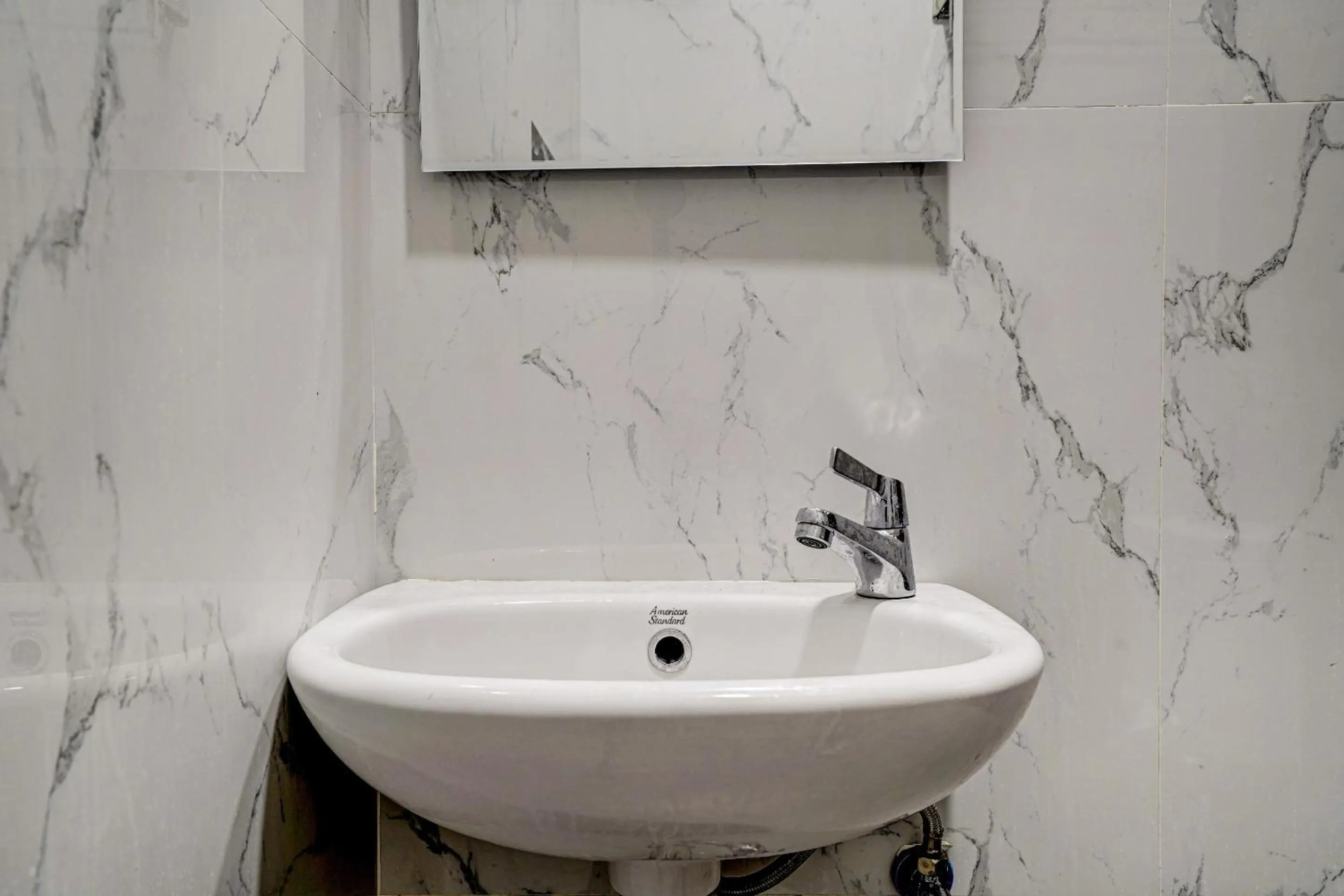 Bathroom in OYO Capital O 90164 La'rissa Residence