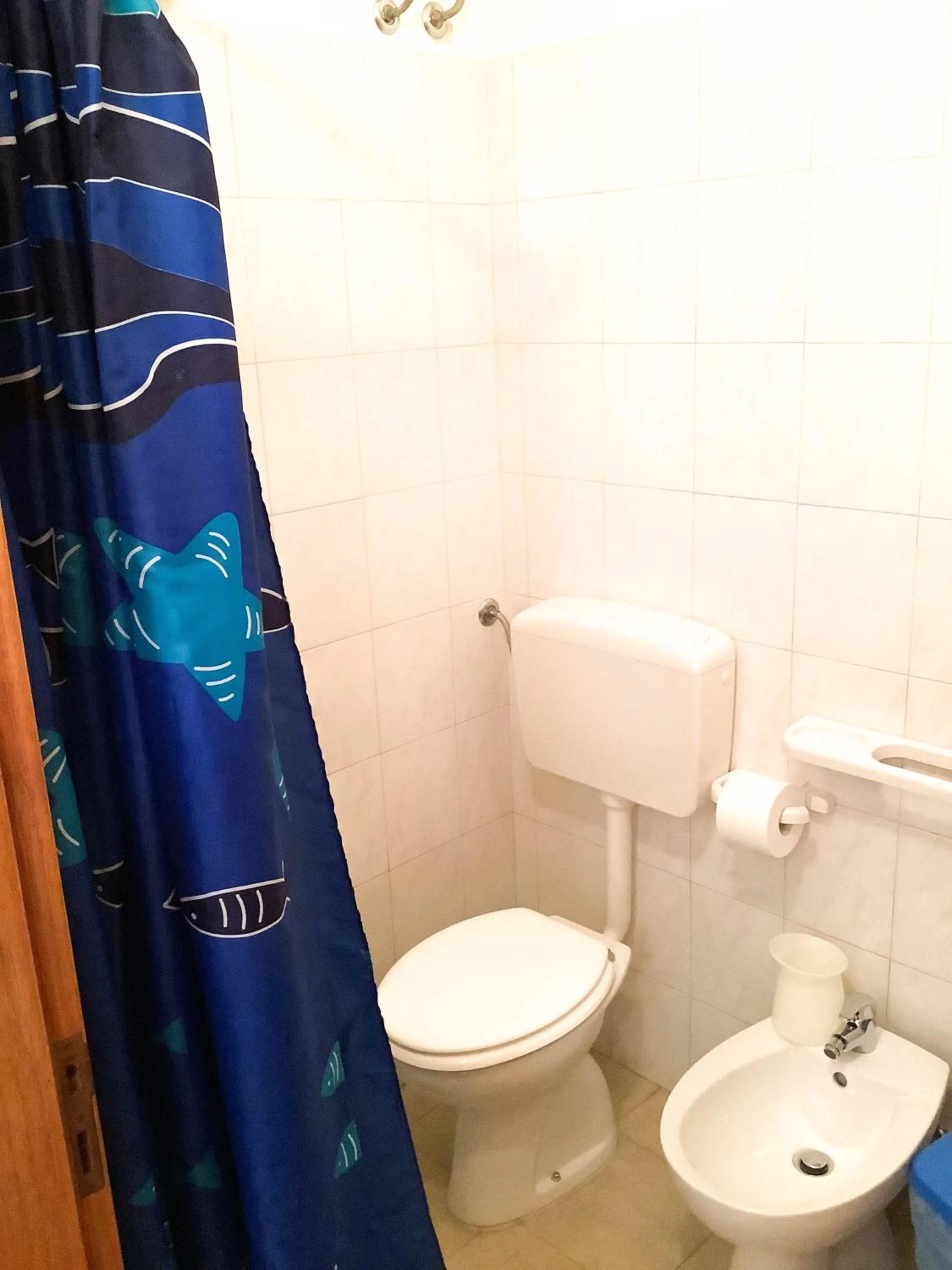 Bathroom in Affittacamere La saracina