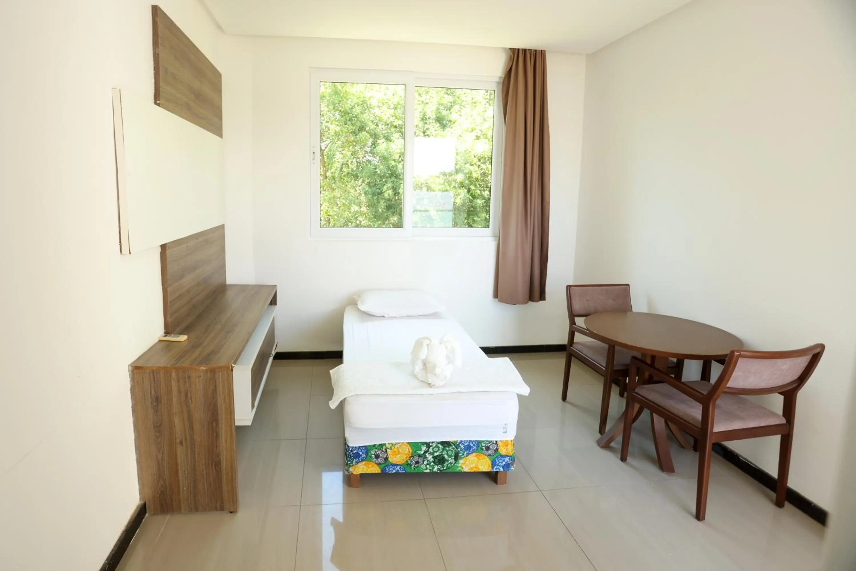 Bed in Pousada Jirituba