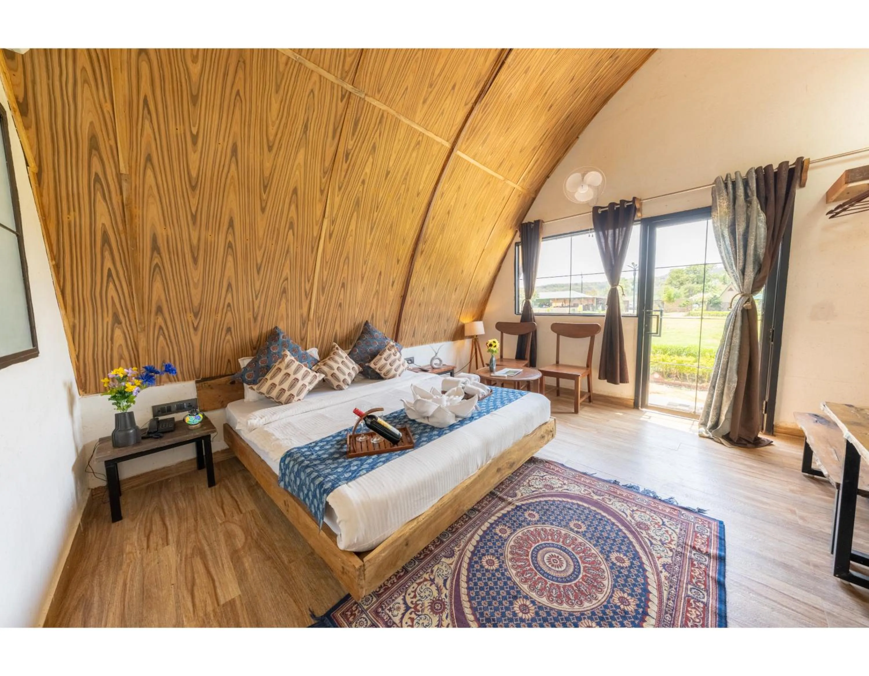 Bed in Panarpani Retreat Pachmarhi