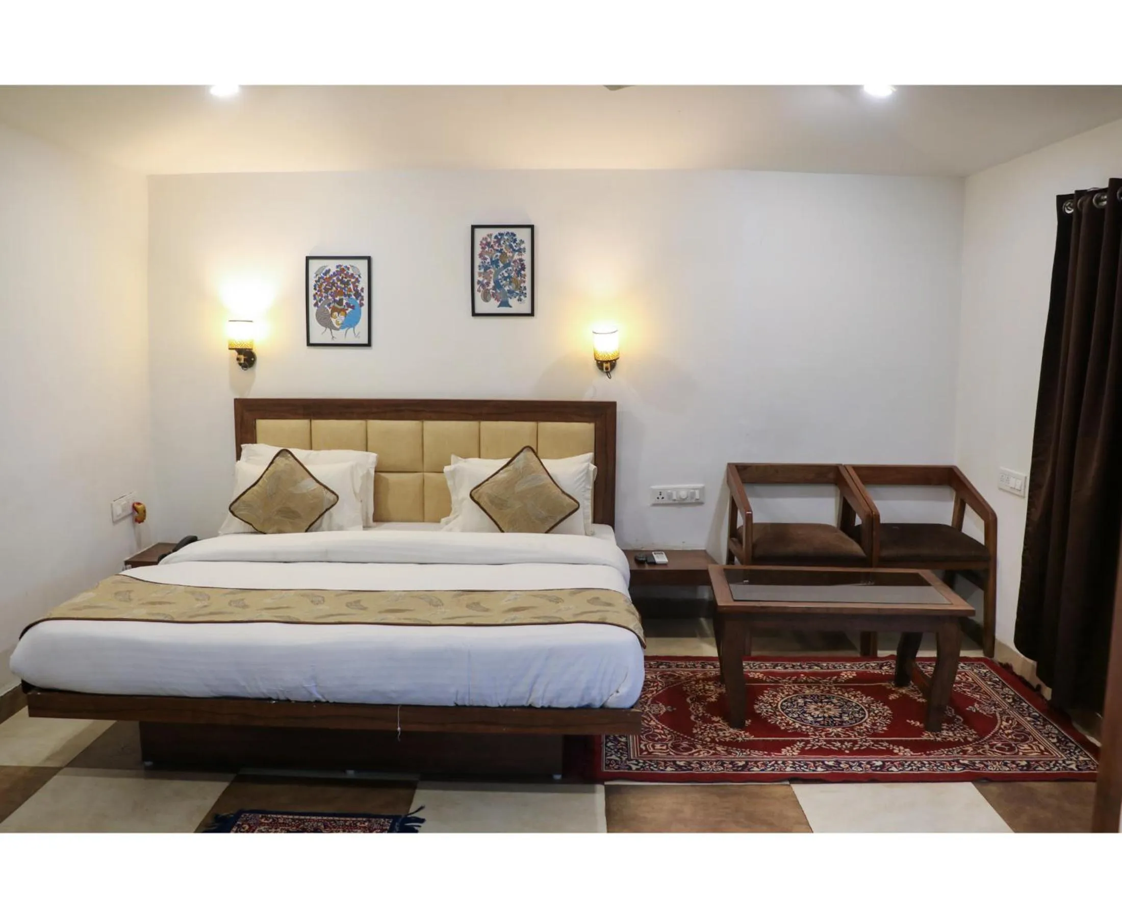 Bed in Panarpani Retreat Pachmarhi