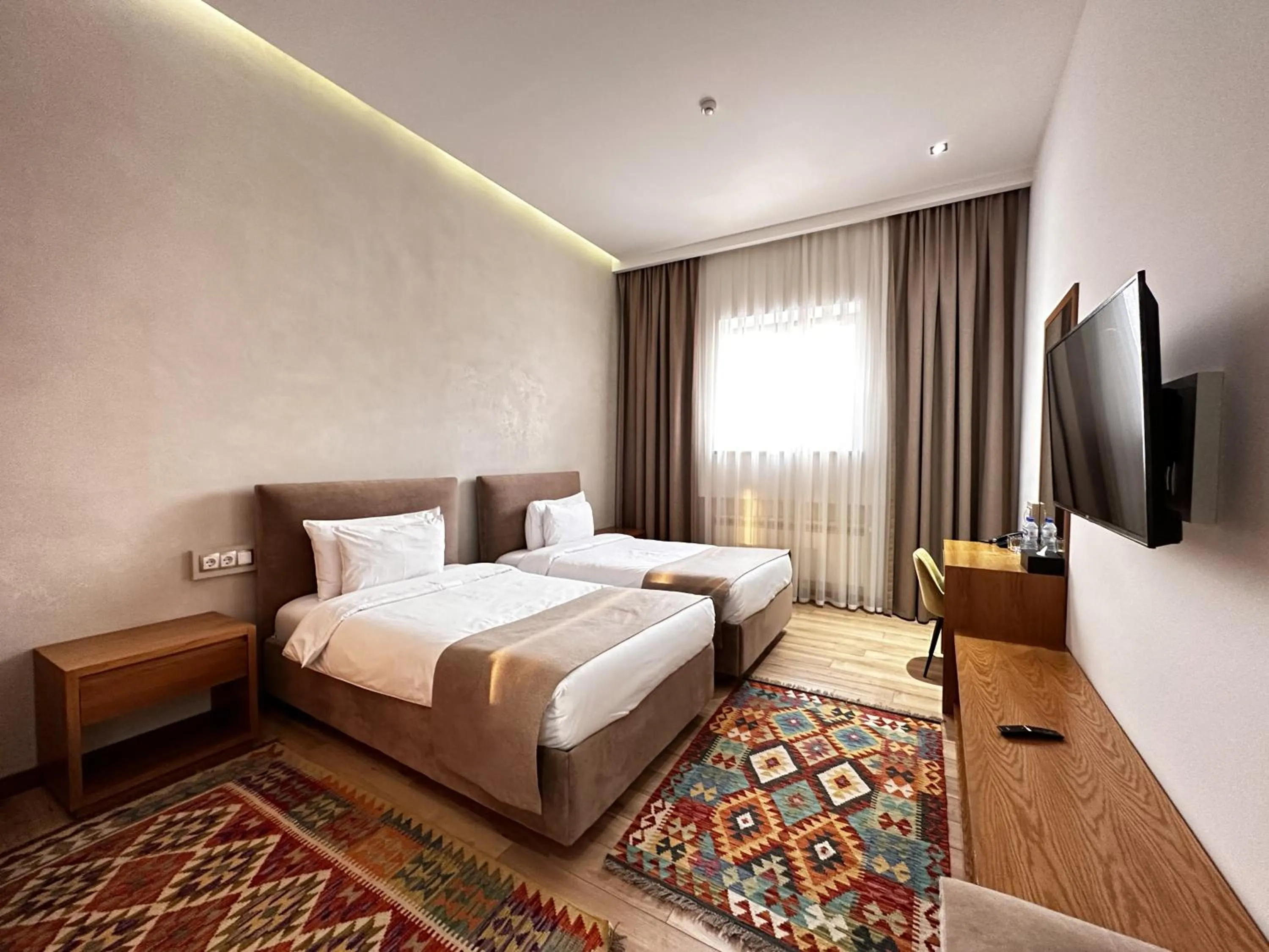 Bed in HOTEL MODERNO & Spa