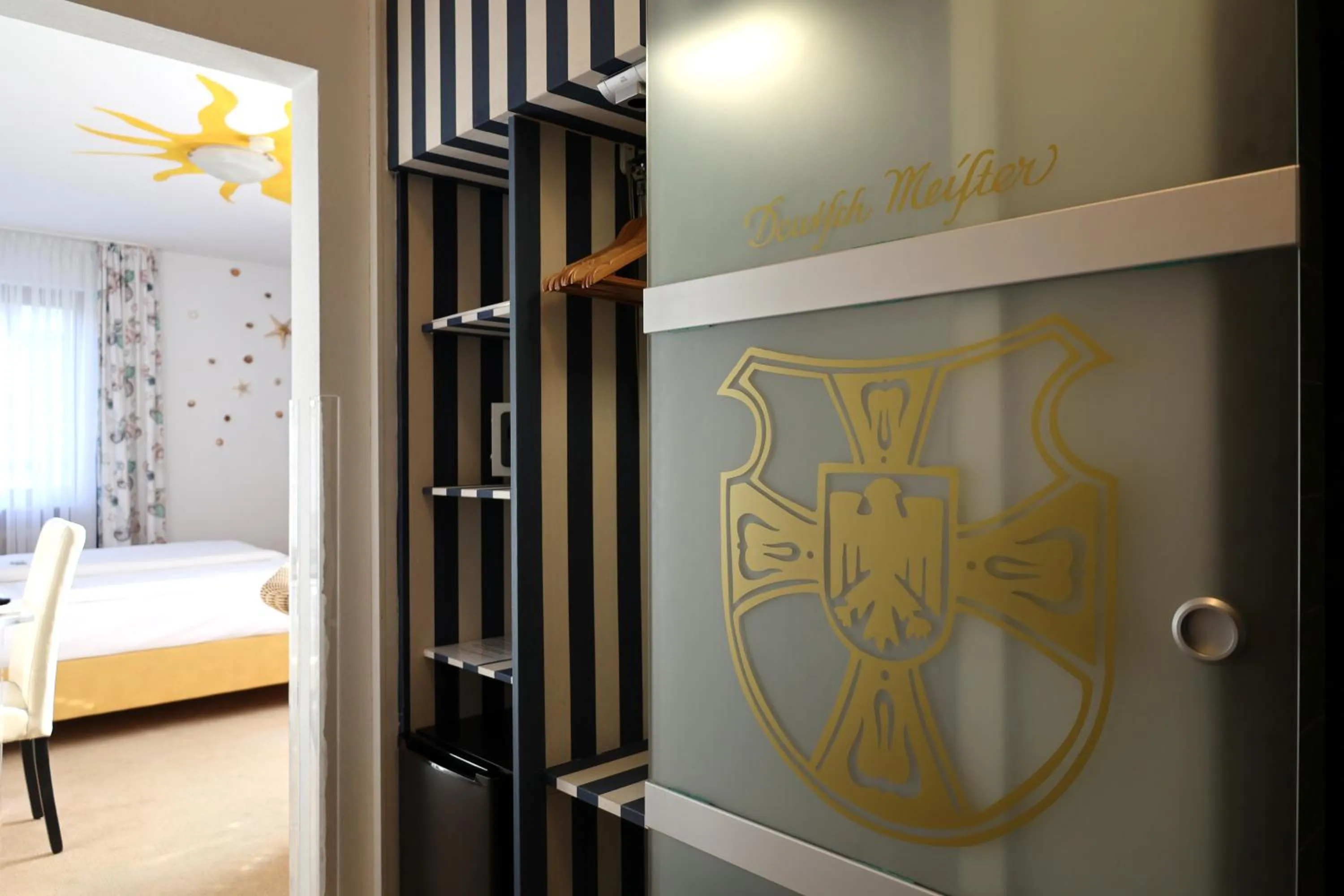 Bed in Aparthotel Deutschmeister