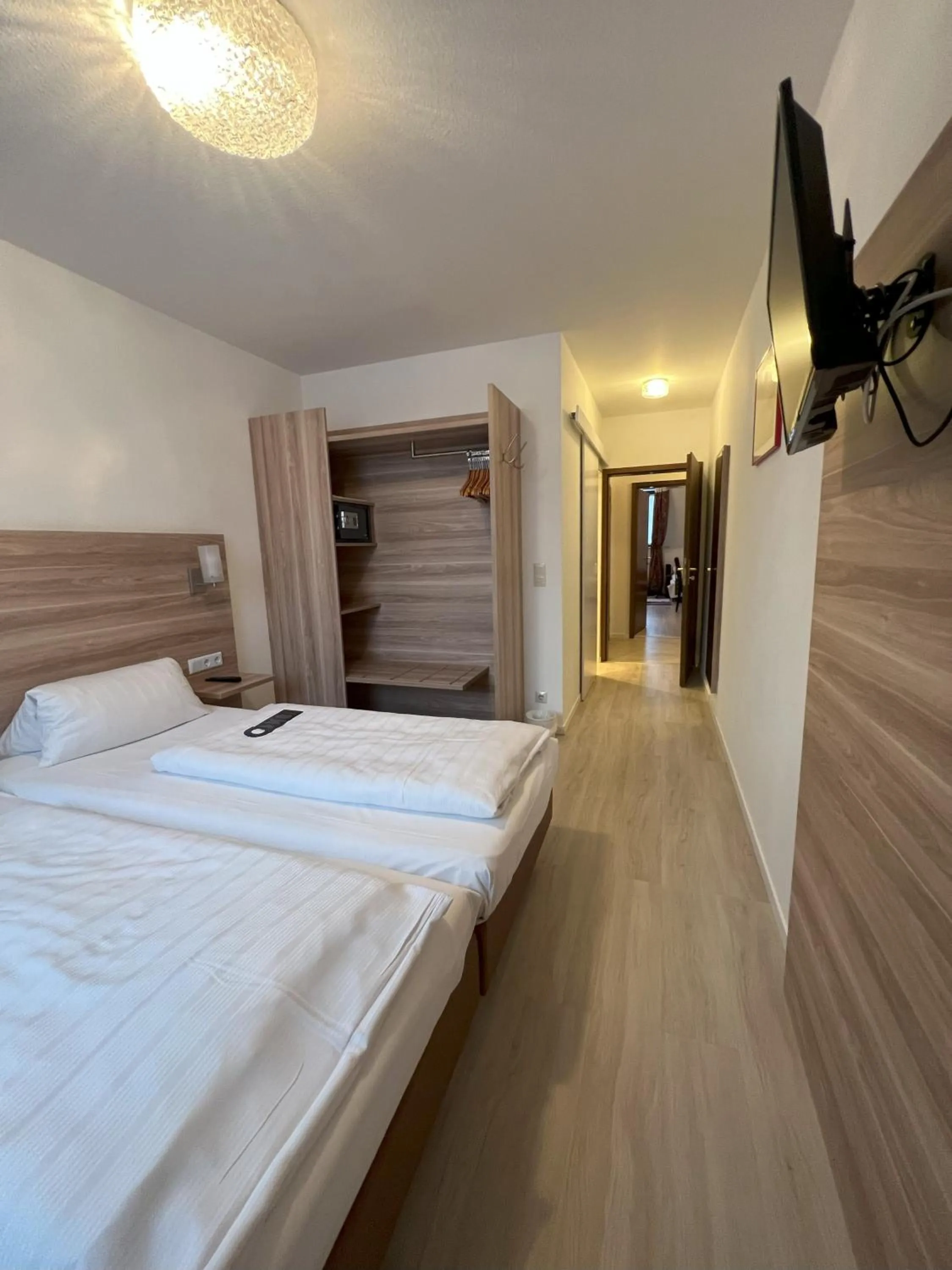 Photo of the whole room, Bed in Aparthotel Deutschmeister