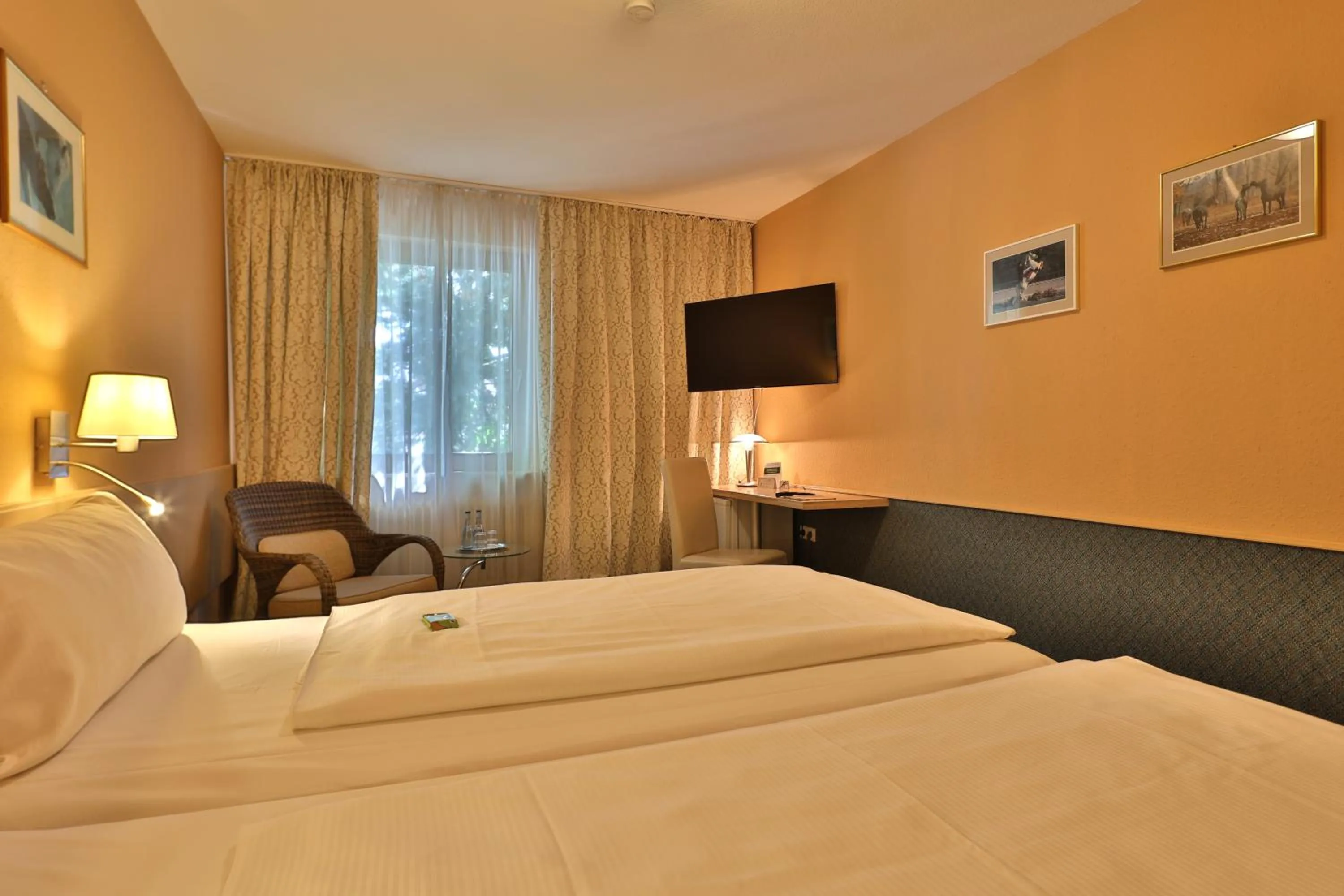 Bed in Aparthotel Deutschmeister