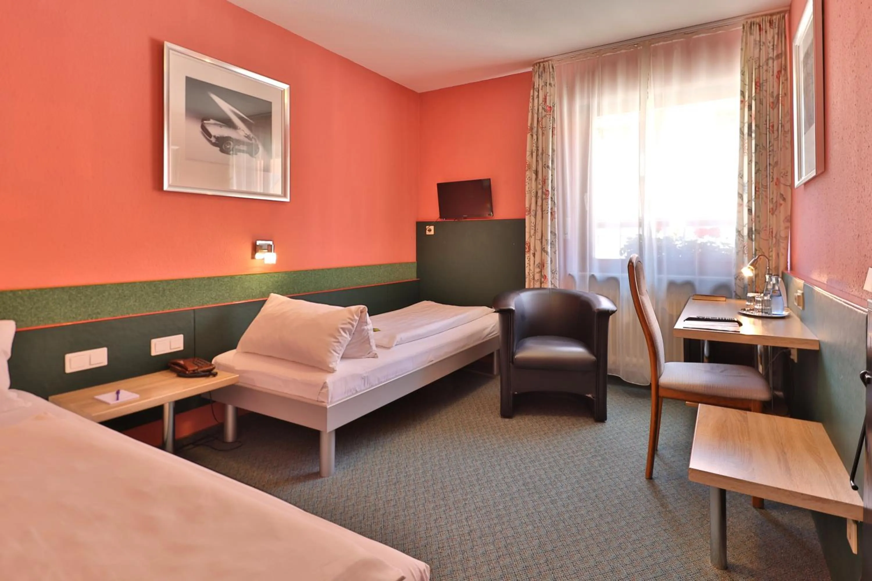 Bed in Aparthotel Deutschmeister