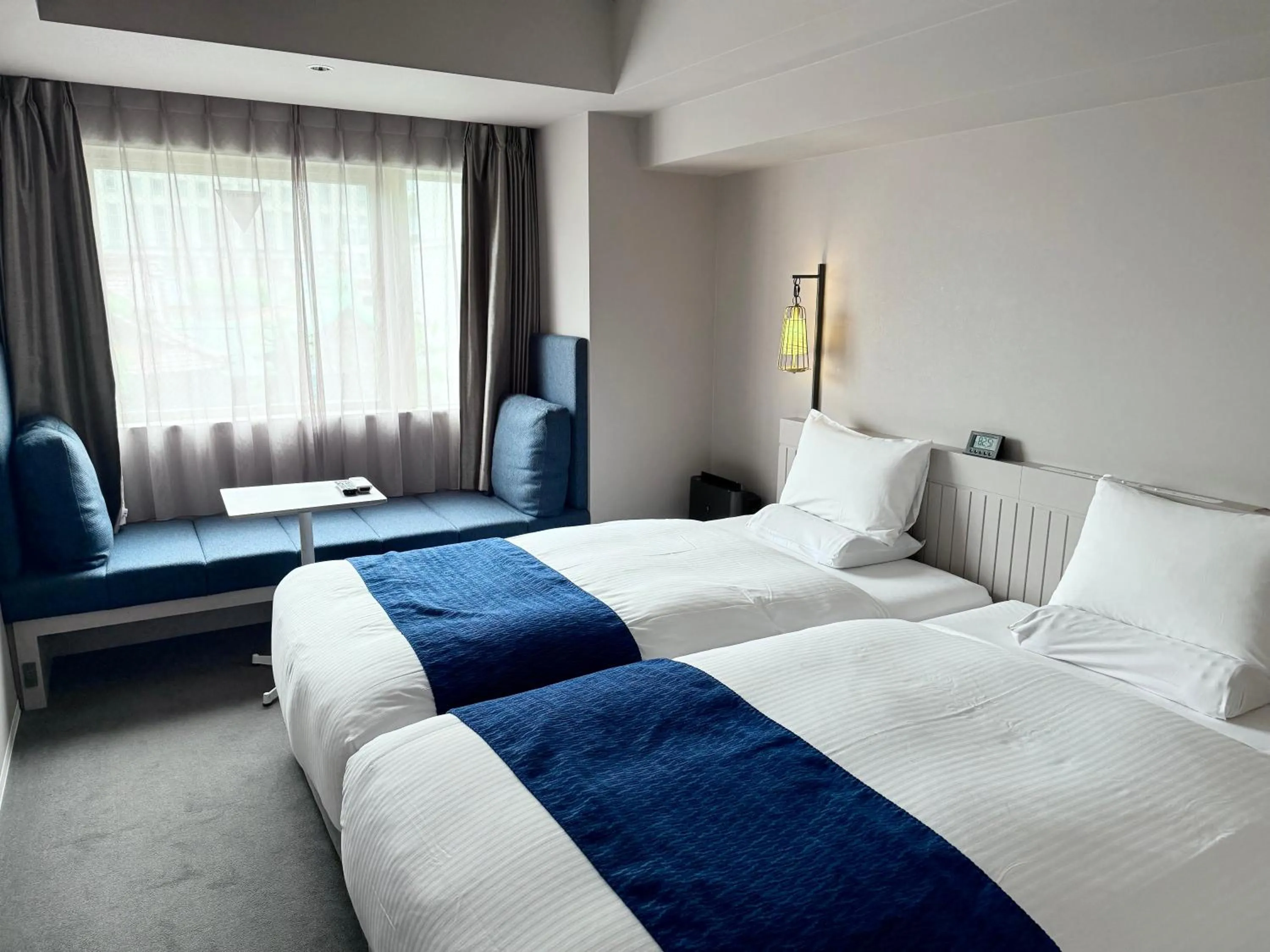 Bed in HOTEL TORIFITO KANAZAWA