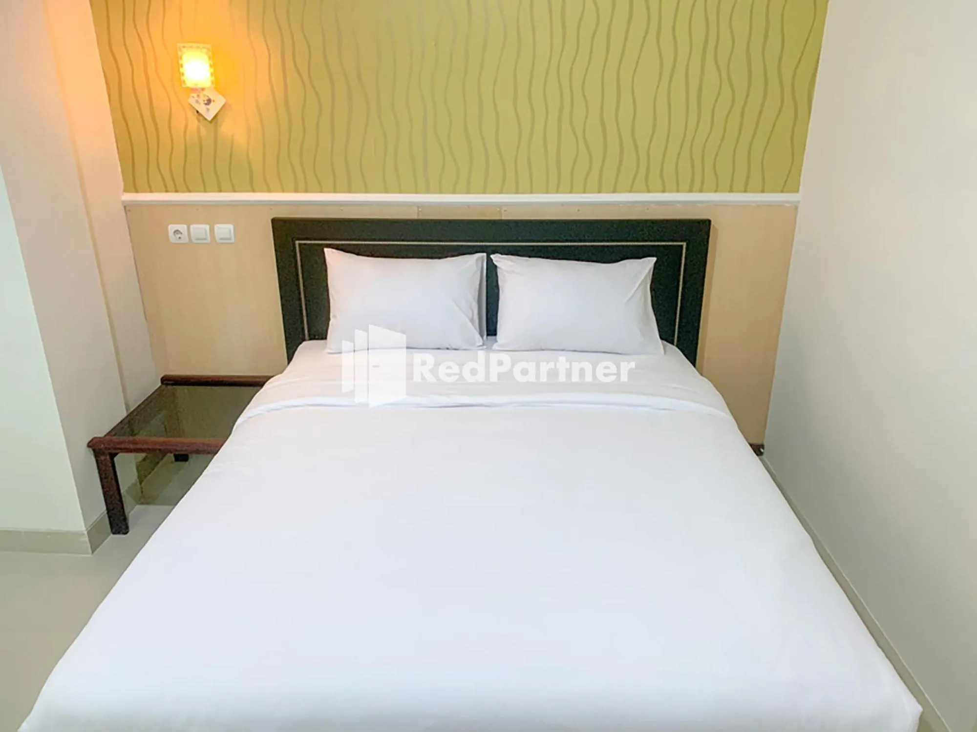 Bedroom in RedDoorz Syariah At Hotel Nuri Indah Dongkelan Yogyakarta