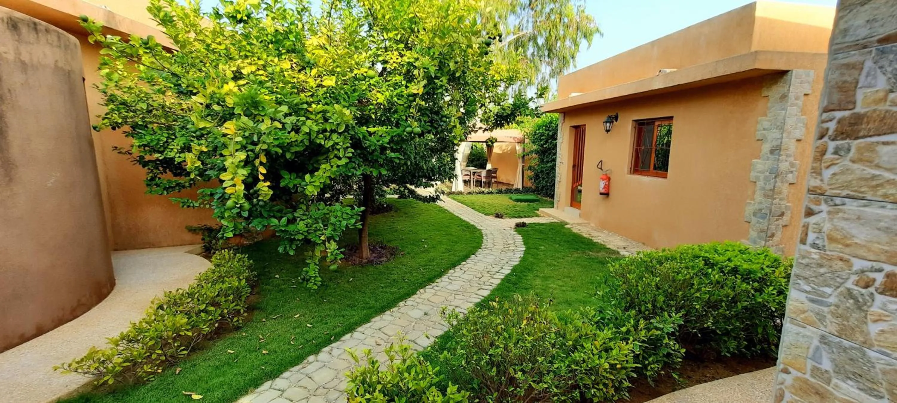 Garden in Hôtel La Belle Etoile & SPA