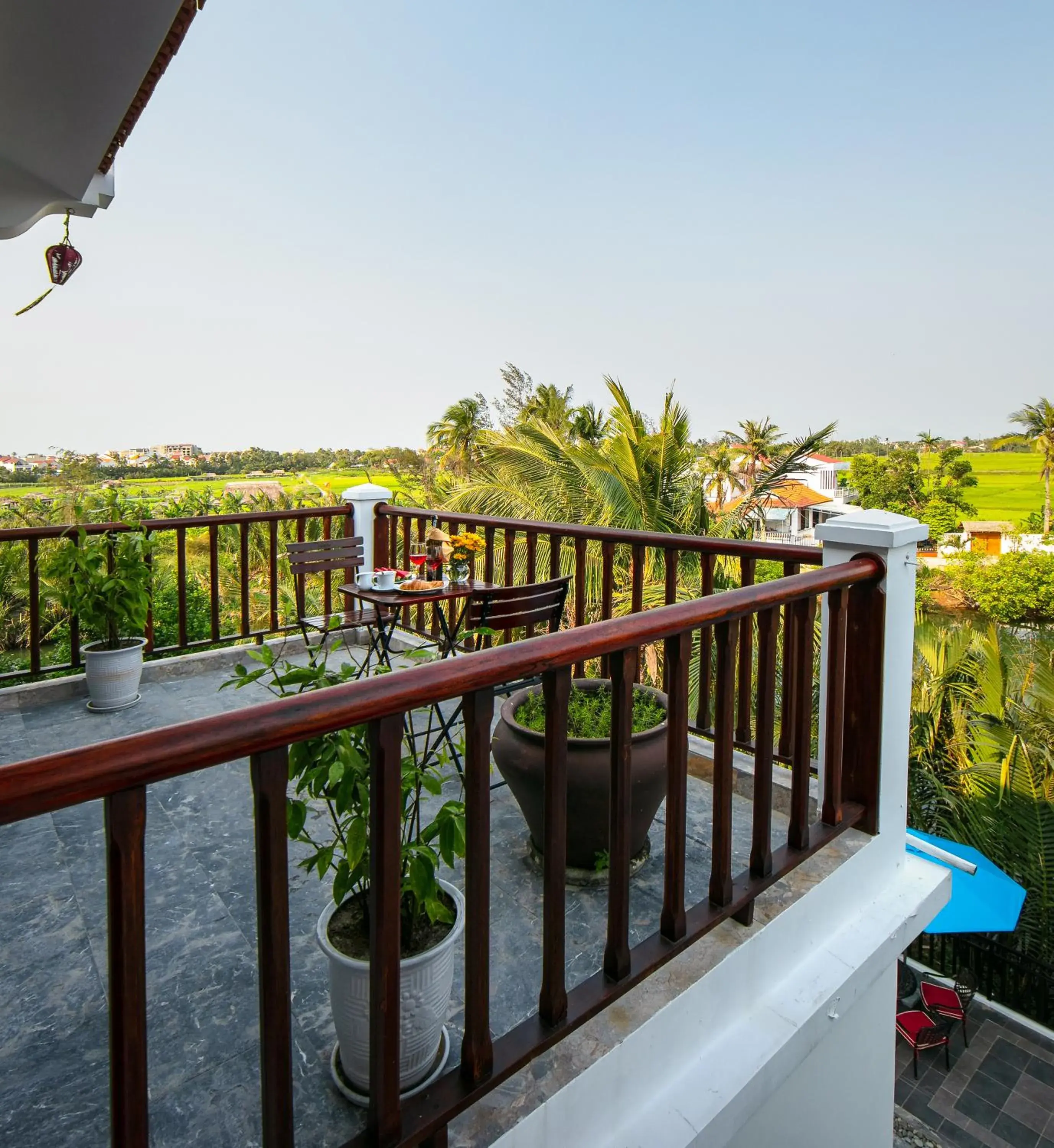 Deluxe Triple Room with Panaroma View Balcony in Hoi An Riverside Villas & Apartments Deluxe Triple Room with Panaroma View Balcony in Hoi An Riverside Villas & Apartments