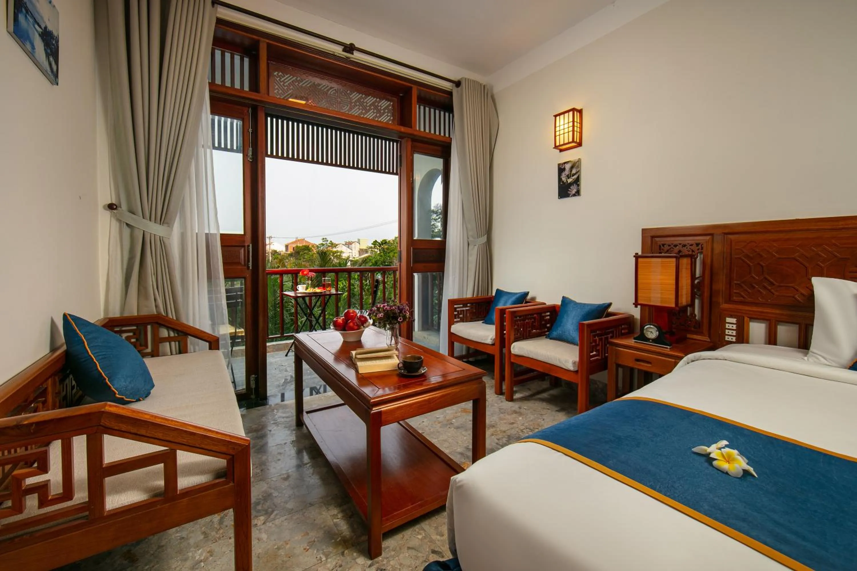 Seating area, Bed in Hoi An Riverside Villas & Apartments