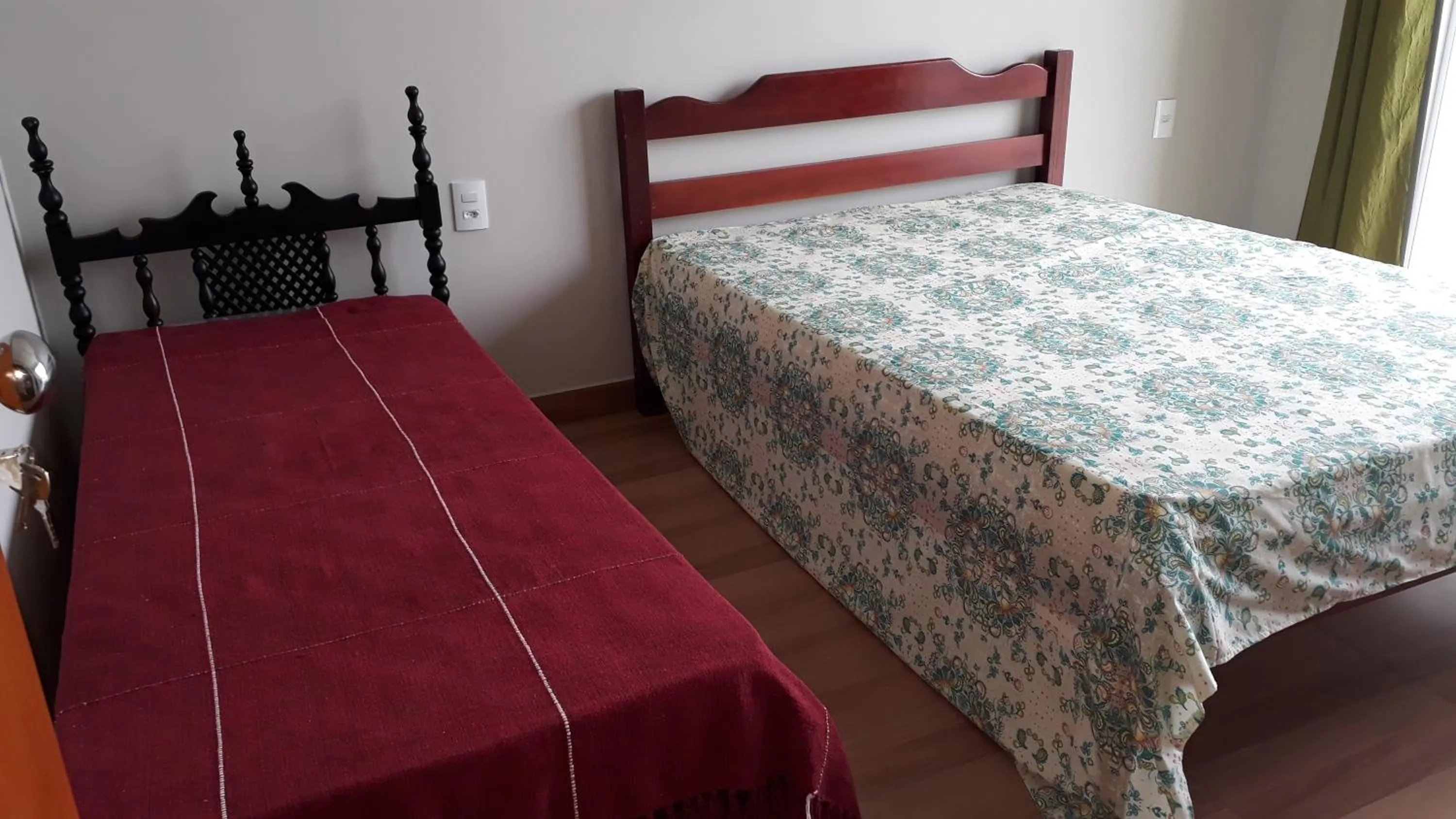 Bed in Pousada Pérola Mineira