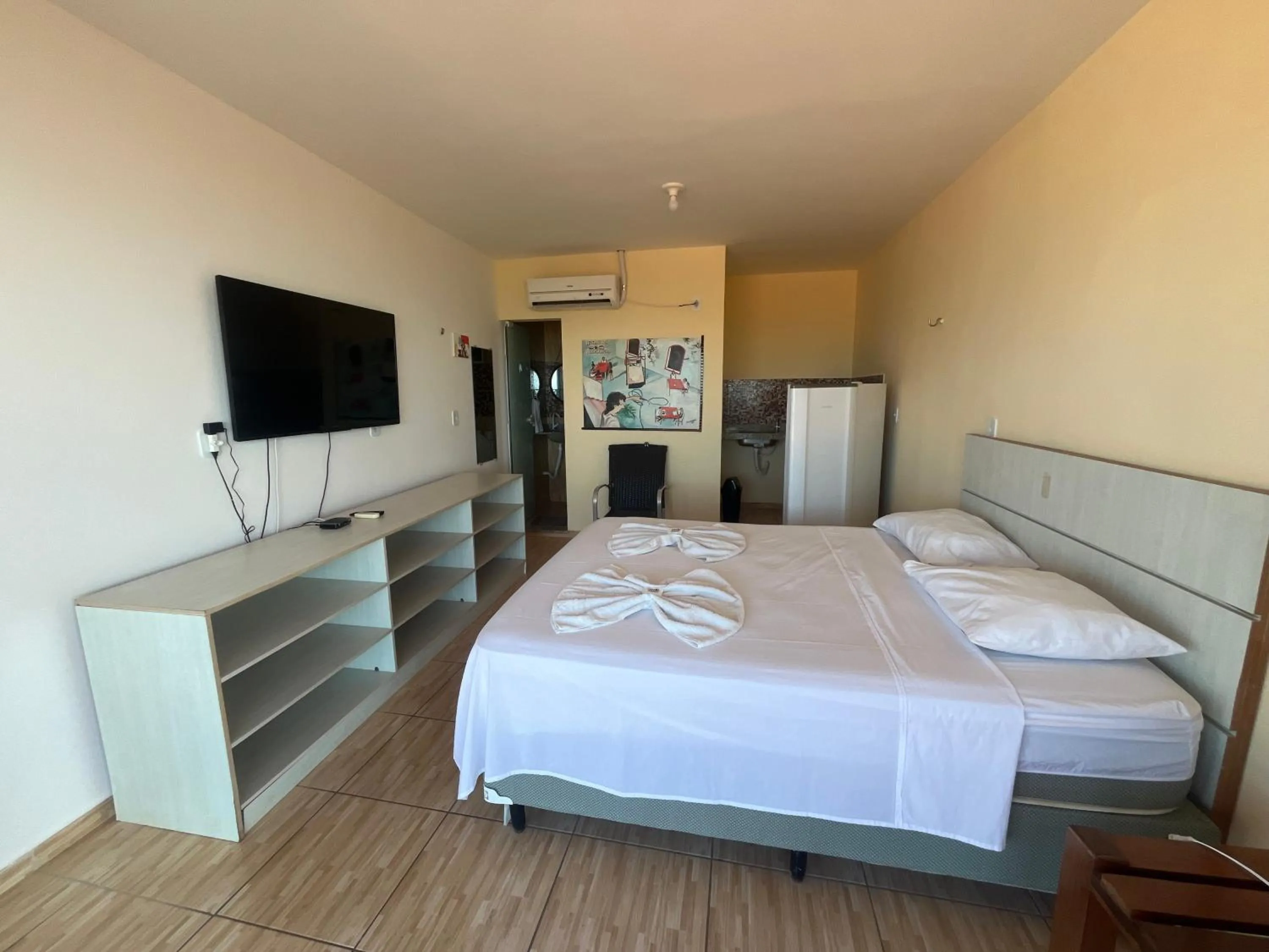 Bed in Pousada Brisa da Canoa