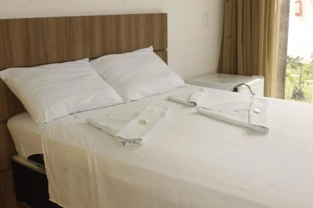 Bed in Pousada Brisa da Canoa